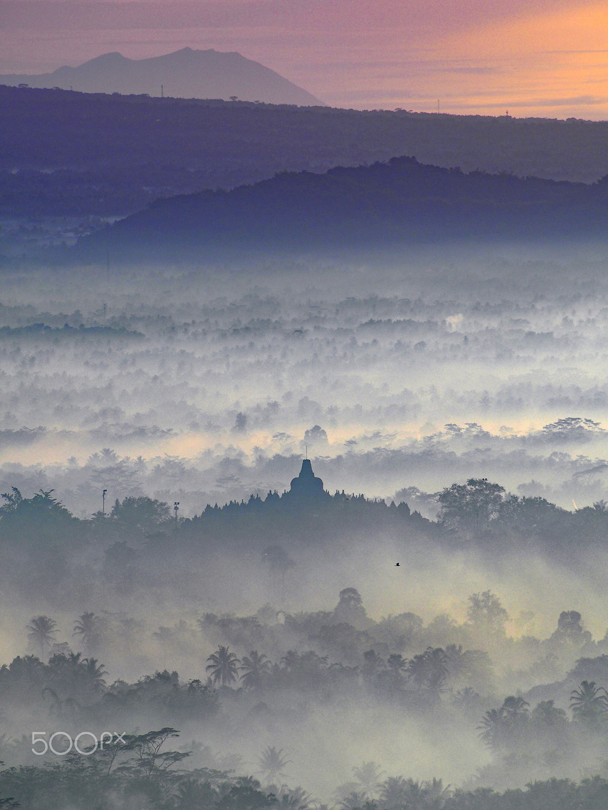 Olympus PEN E-P5 + Olympus M.Zuiko ED 75-300mm F4.8-6.7 II sample photo. Magnificent borobudur in a foggy morning photography