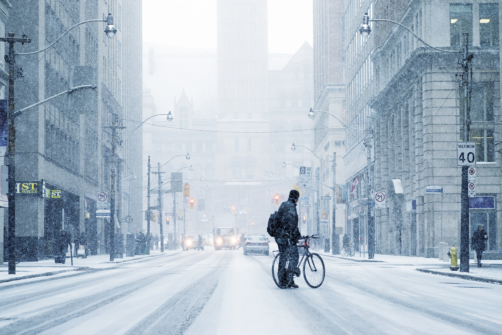 Fujifilm X-T1 sample photo. The risks of a winter cyclist photography