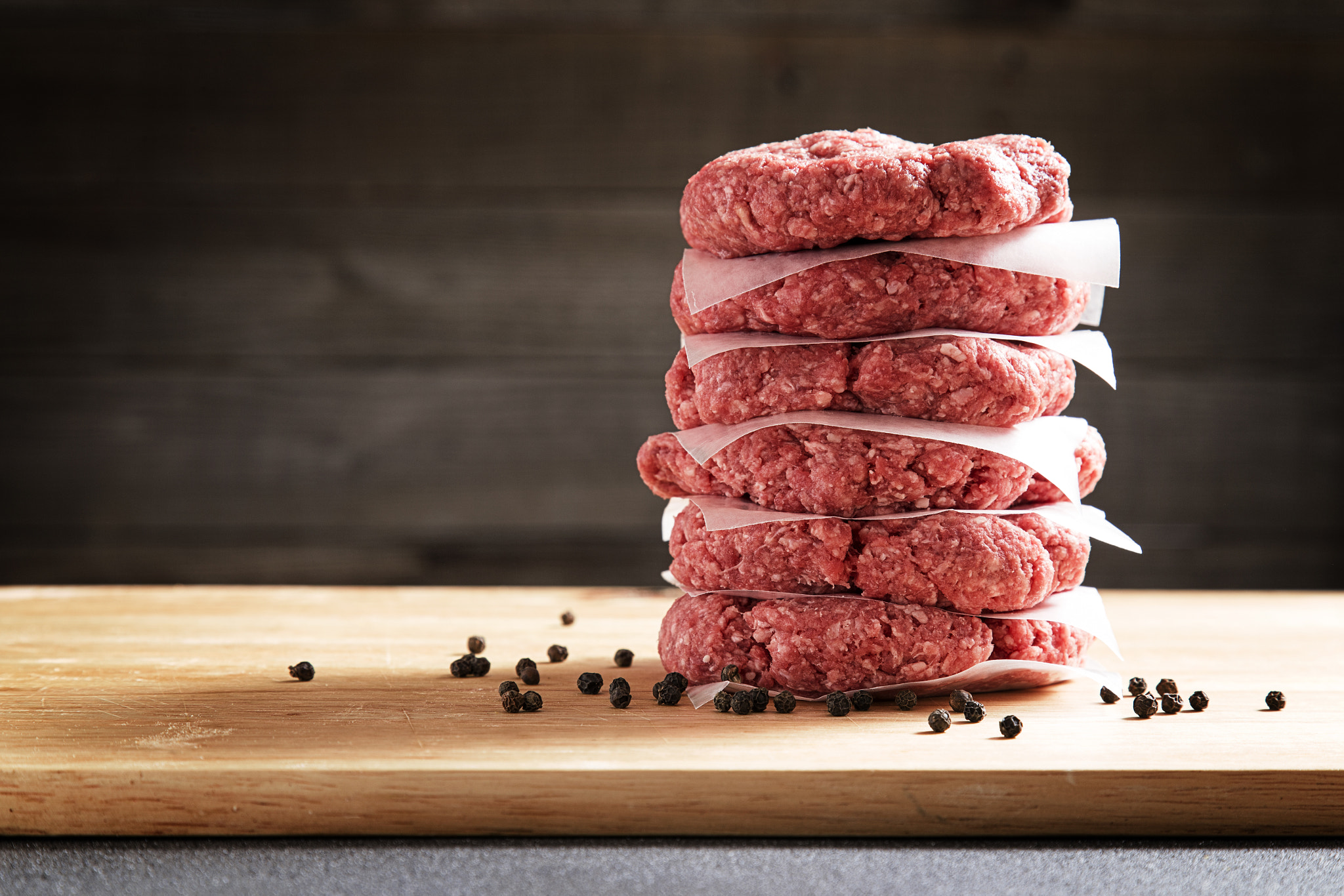 Canon EOS-1D X sample photo. Stack of six raw hamburgers photography
