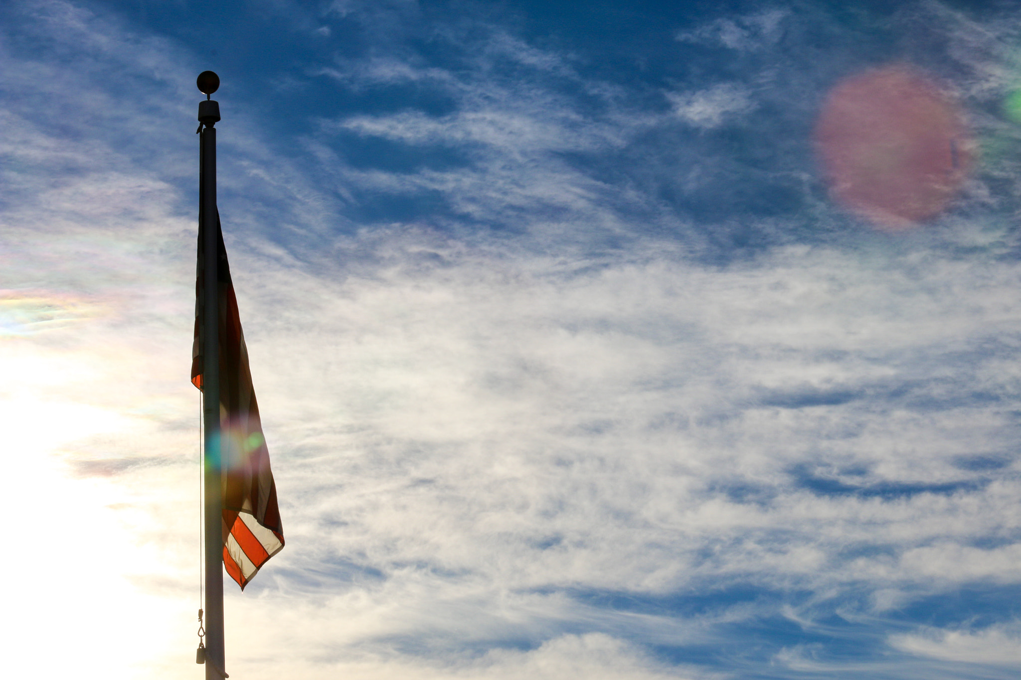 Canon EOS 70D + Canon EF 70-200mm F4L IS USM sample photo. First light on the flag. photography