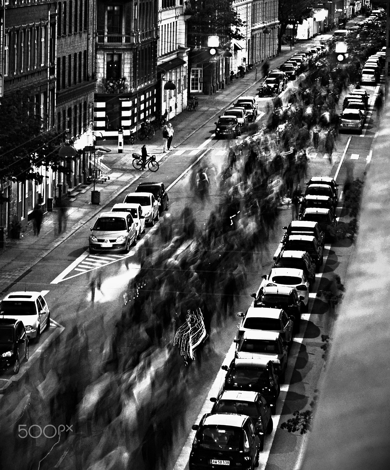 Sony Alpha NEX-5R sample photo. A river of people skating through the city photography