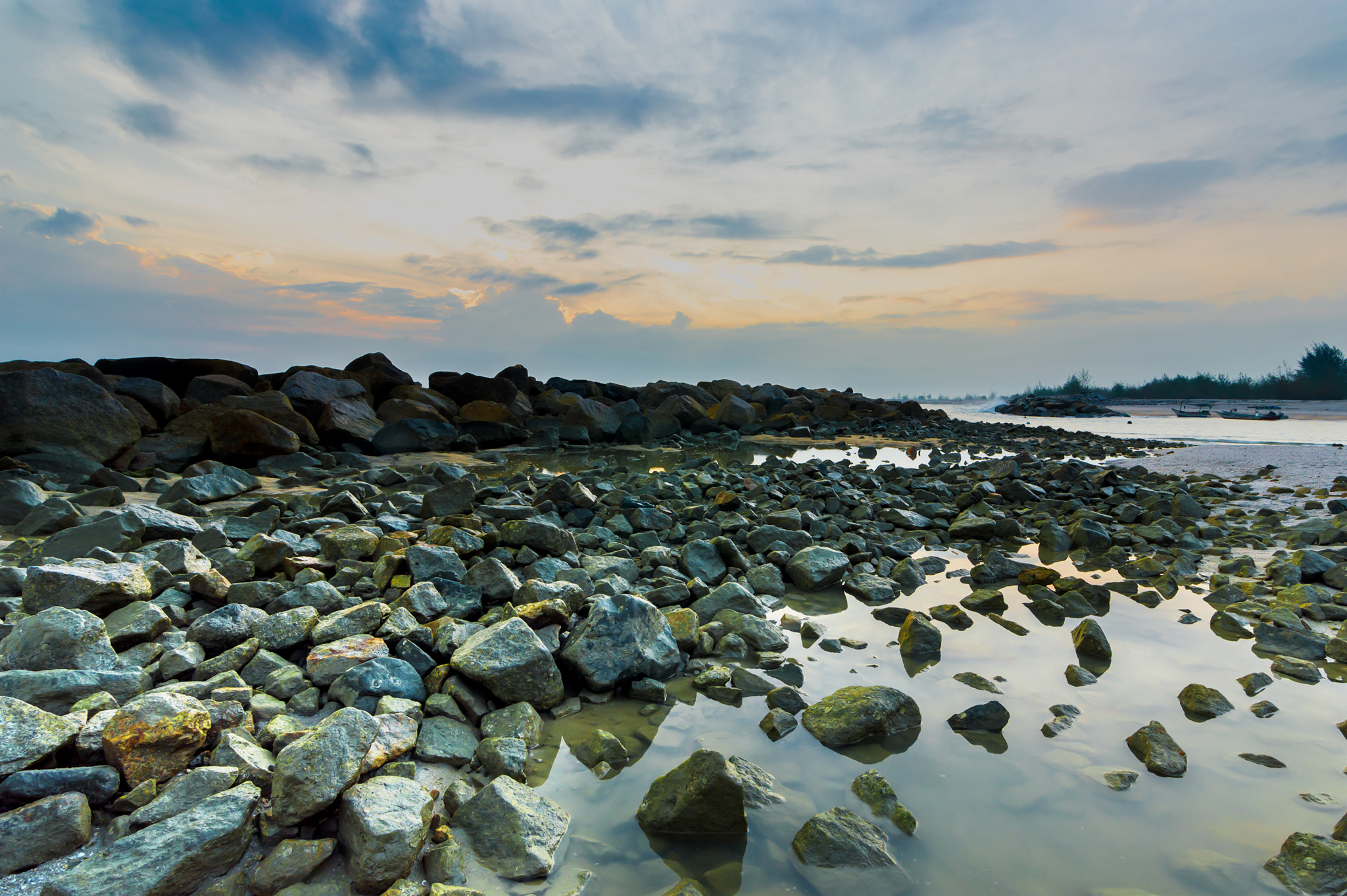 Nikon D3200 sample photo. Beach stone with sunrise background photography
