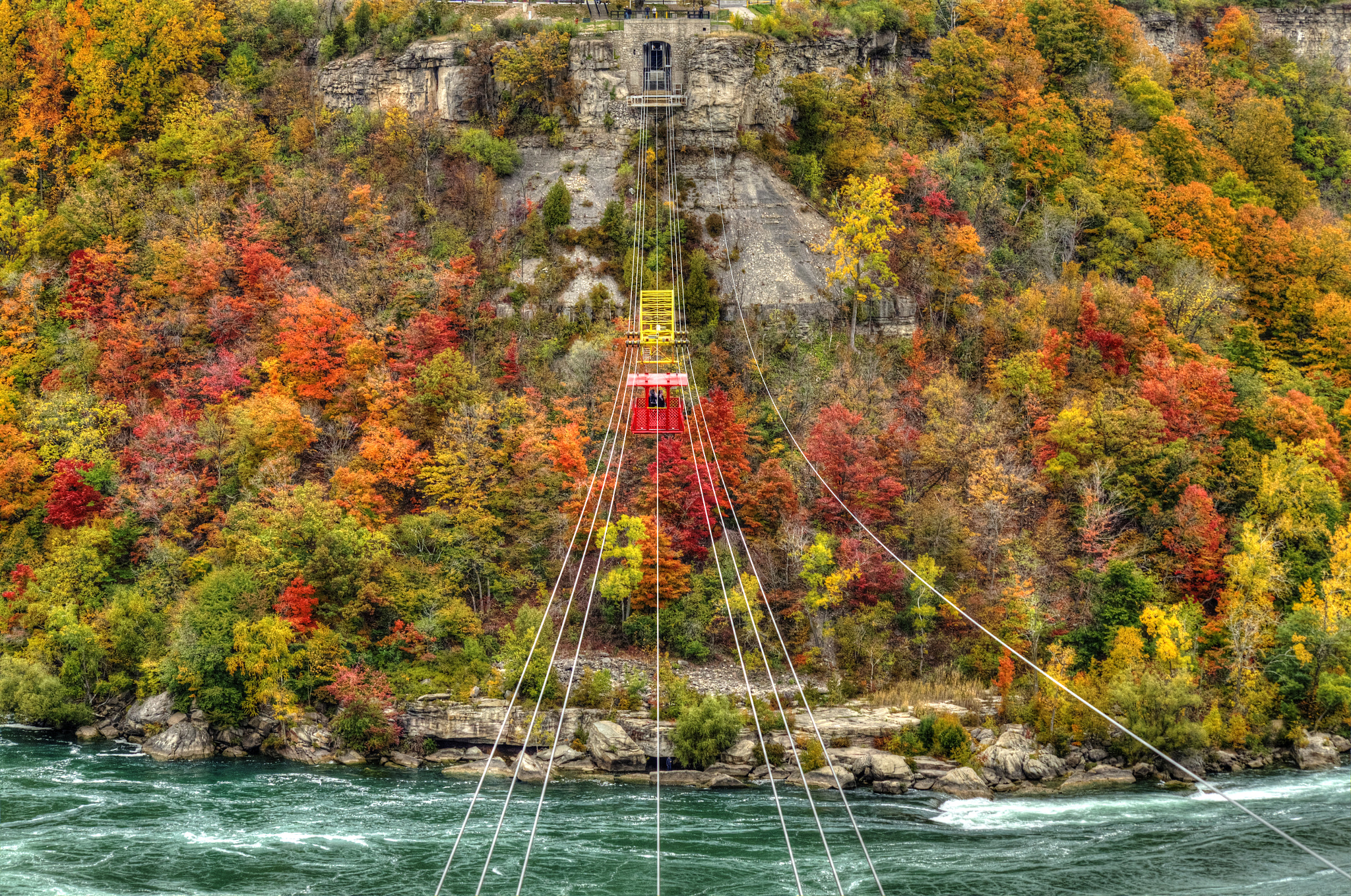 Nikon D7000 + AF Nikkor 70-210mm f/4-5.6 sample photo. Chair lift in a beautiful precipice photography