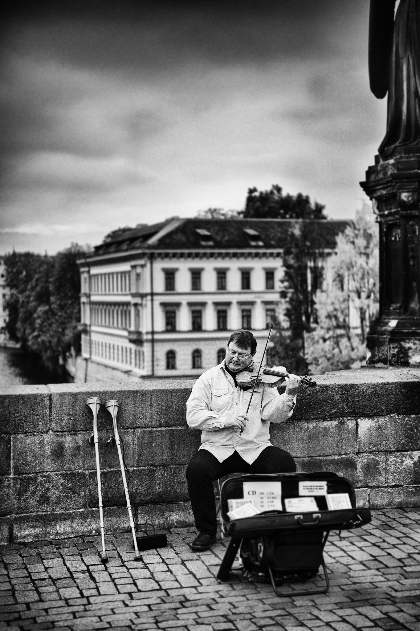 Nikon Df sample photo. Violinist on the bridge photography