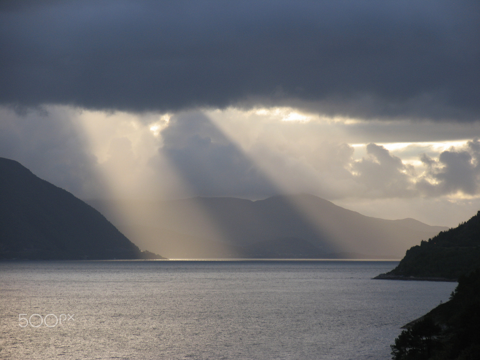 Canon POWERSHOT PRO1 sample photo. Rain & sunset in fiord photography