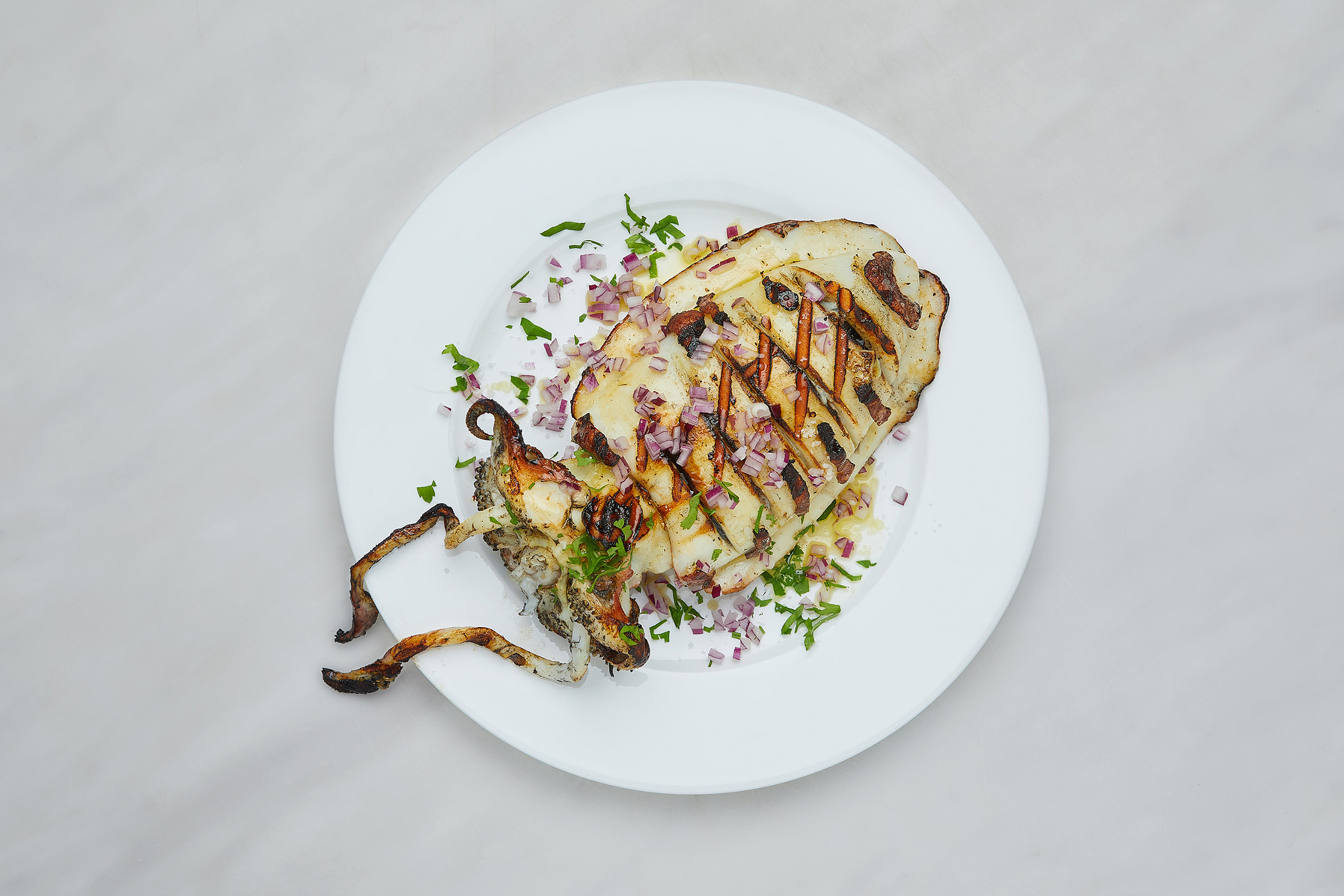 Grilled cuttlefish with ink.