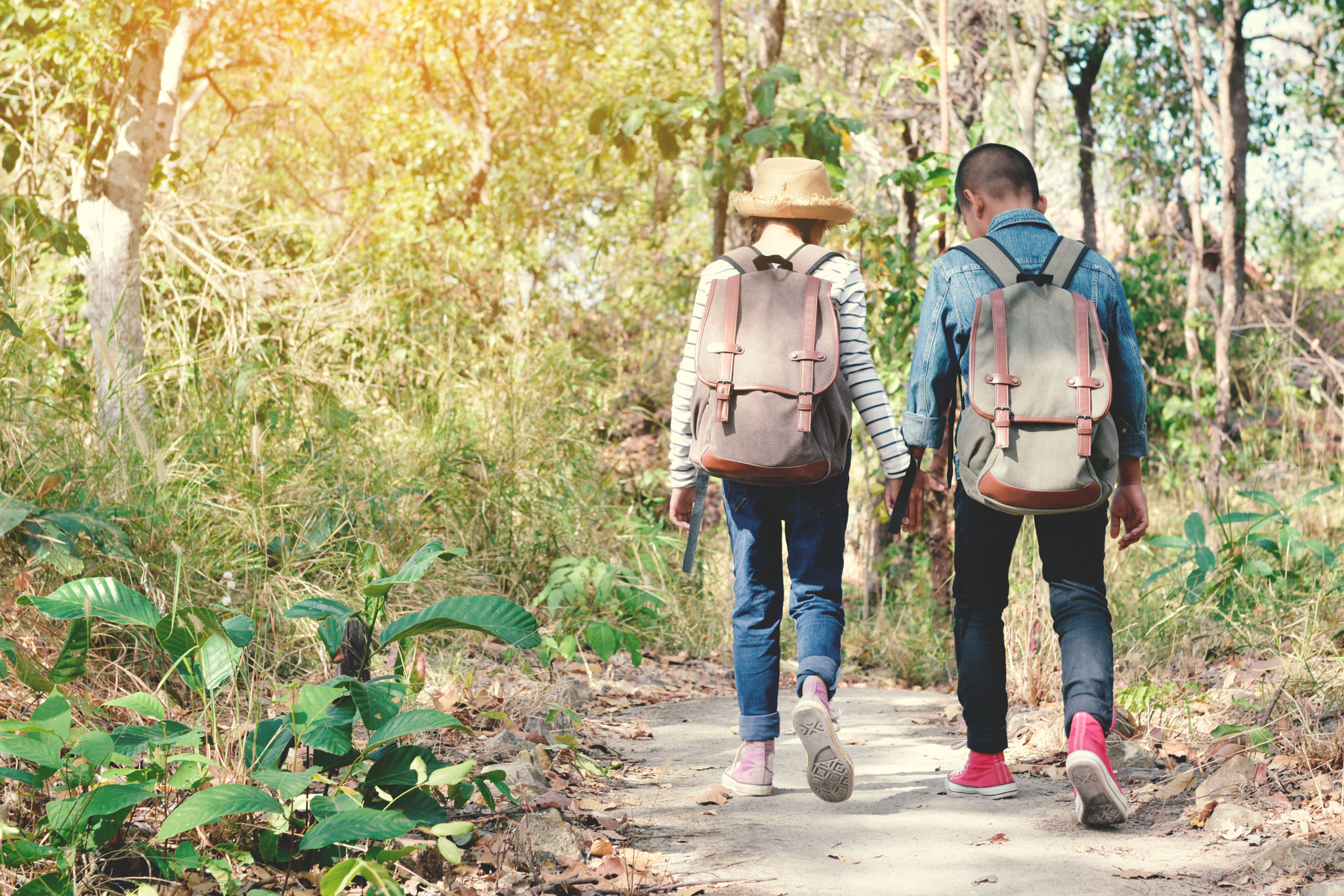 Nikon AF-S Nikkor 24-70mm F2.8G ED sample photo. Happy asian children backpack in nature background, relax time on holiday photography
