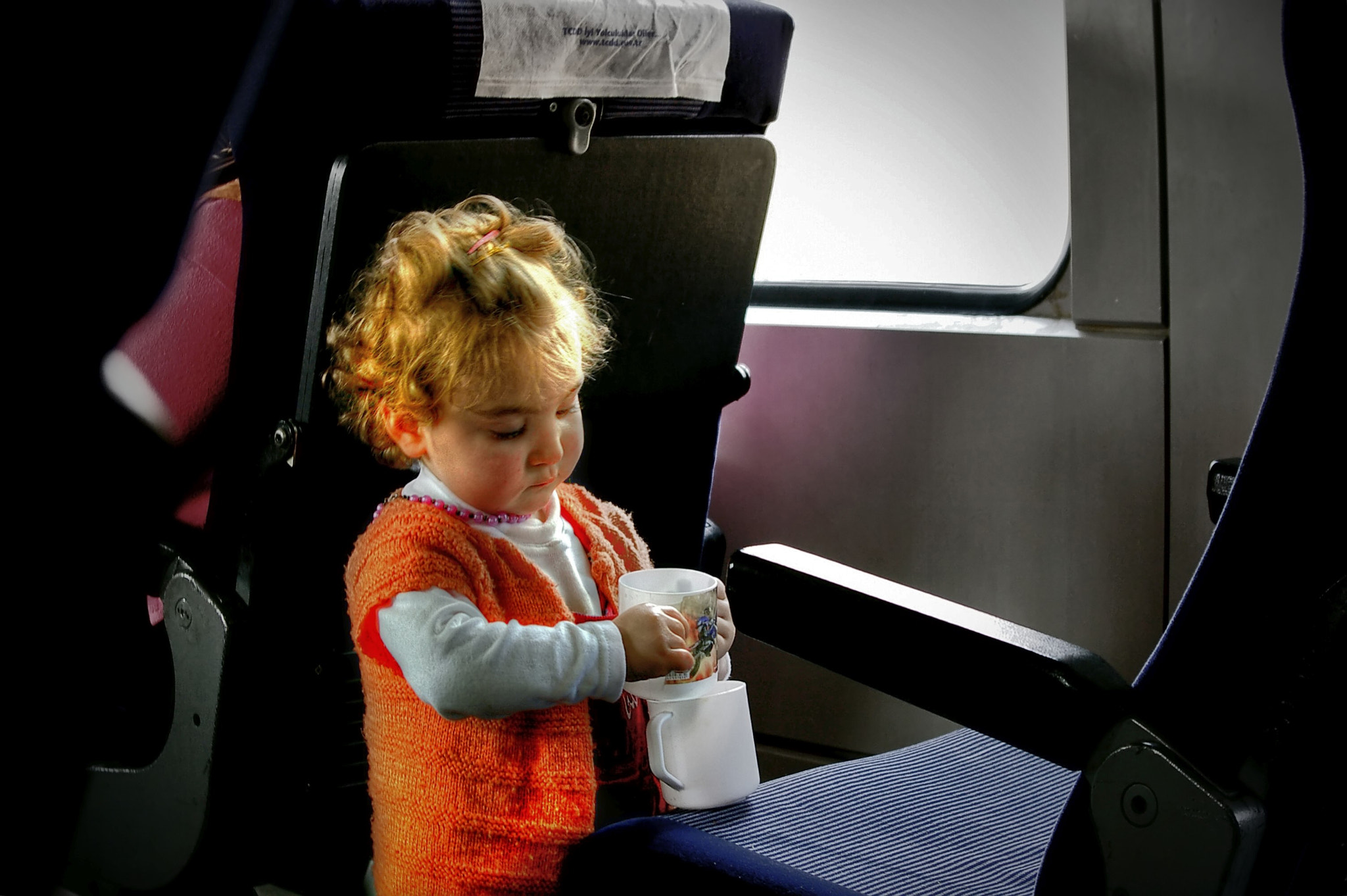 Pentax K100D Super sample photo. Little lady playing in train photography