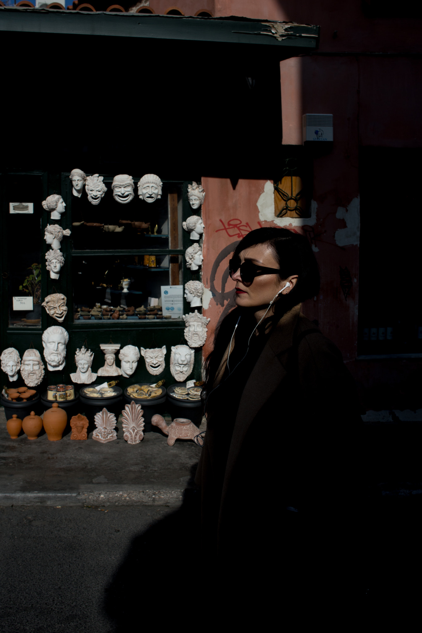 Canon EF 28mm F2.8 IS USM sample photo. Woman and masks photography
