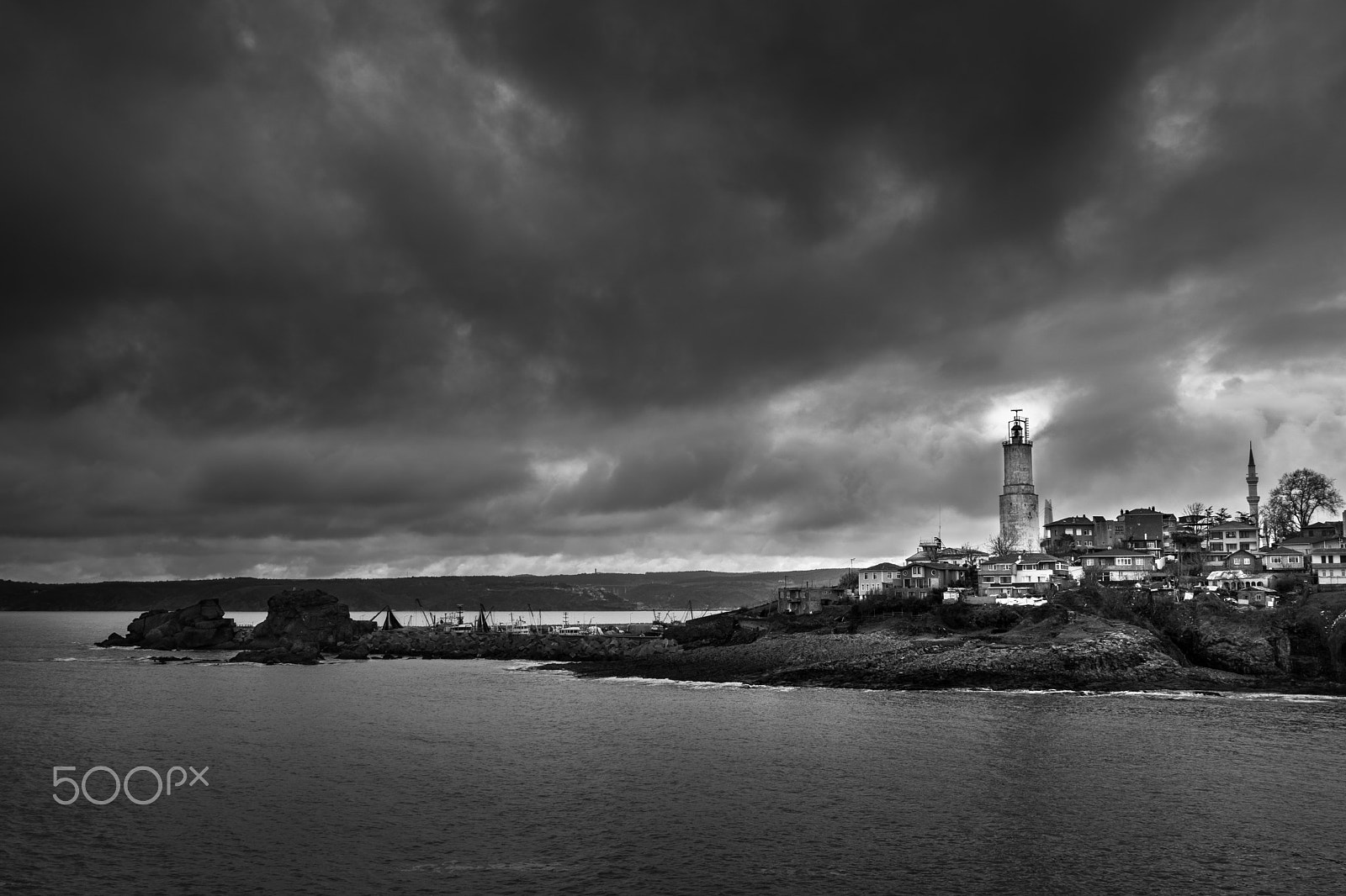 Sony Sonnar T* E 24mm F1.8 ZA sample photo. A lighthouse and the sky photography