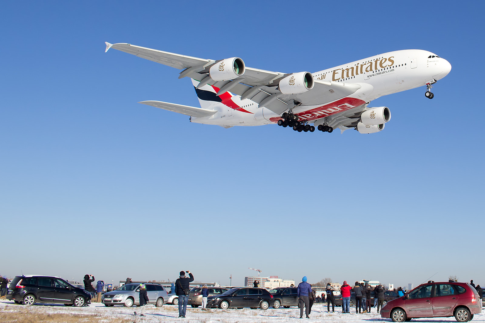 Canon EOS 60D + Canon EF-S 18-55mm F3.5-5.6 IS STM sample photo. A380 emirates at warsaw chopin airport photography