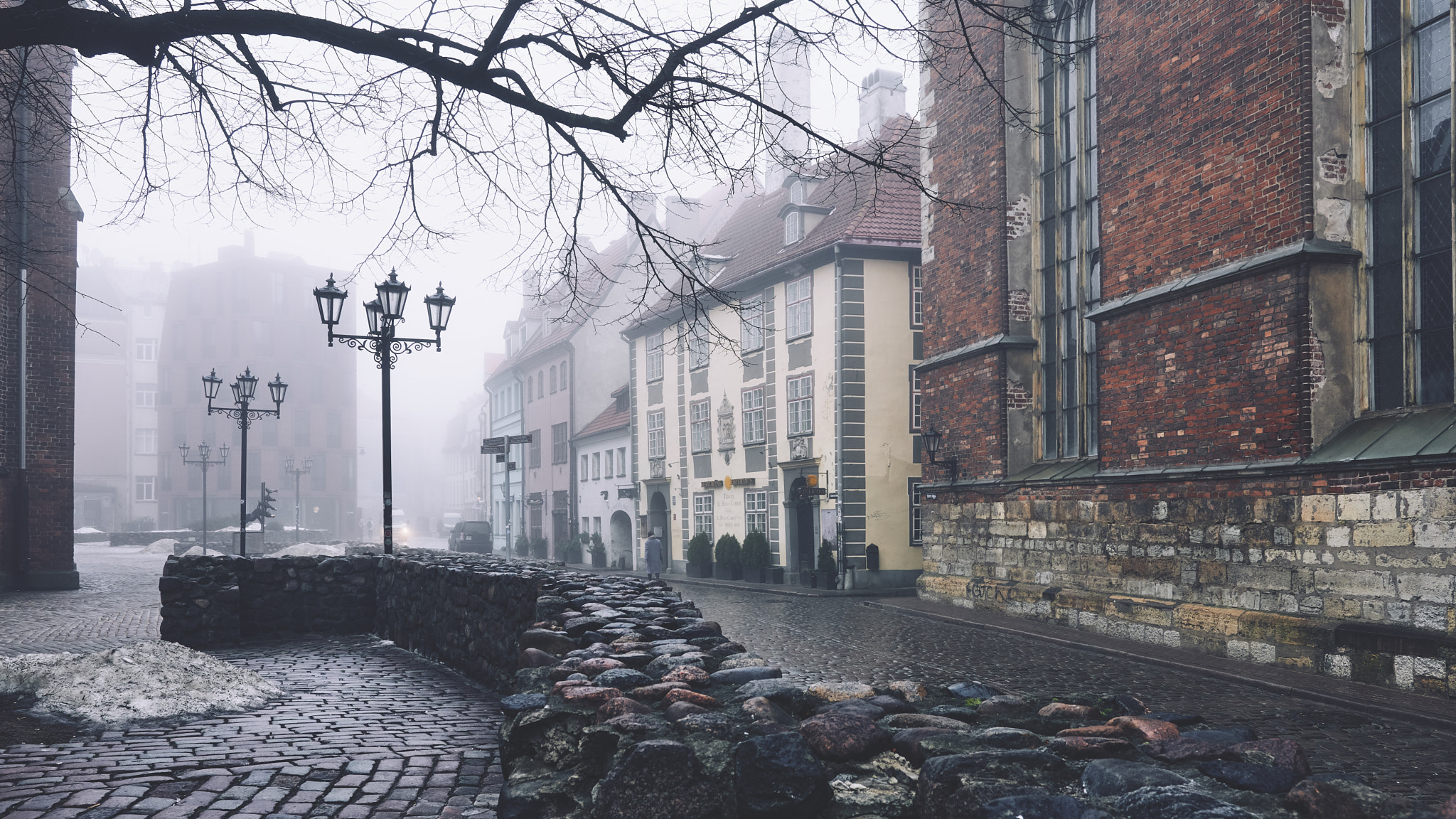 18-35mm F1.8 DC HSM | Art 013 sample photo. Riga old town having a silent hill moment photography