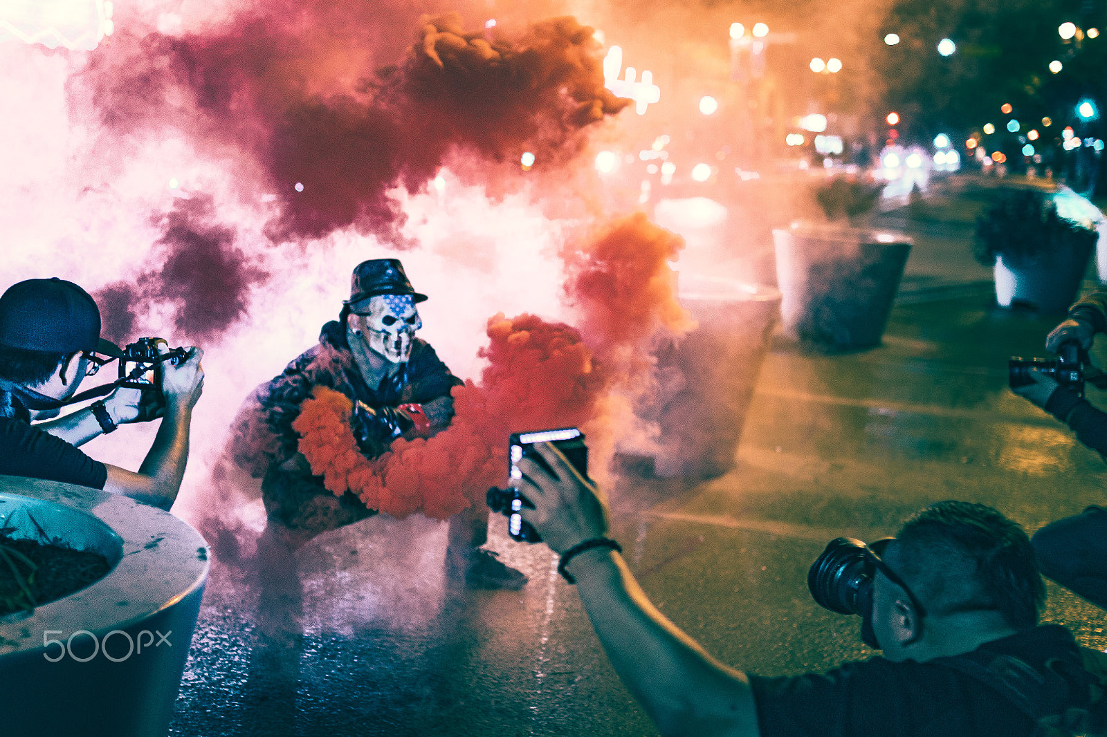 Canon EOS 1200D (EOS Rebel T5 / EOS Kiss X70 / EOS Hi) + Sigma 30mm F1.4 EX DC HSM sample photo. Photographers take pictures of masked man with smoke grenade photography