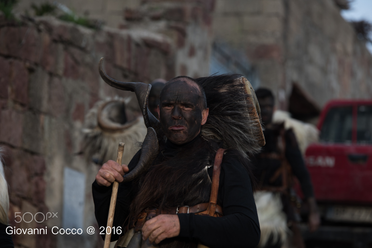 Nikon D810 + Tamron SP 70-200mm F2.8 Di VC USD sample photo. Sardinian carnival eyes & hands photography