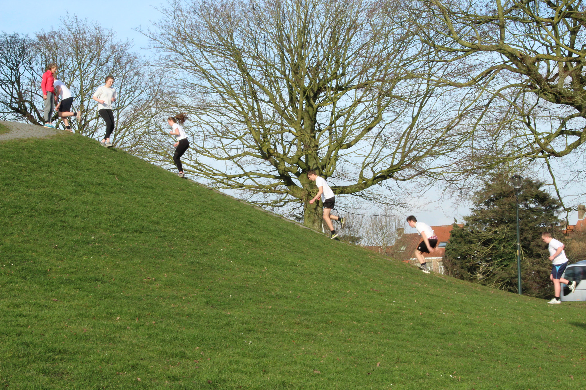 Canon EF-S 18-135mm F3.5-5.6 IS sample photo. People jumping photography