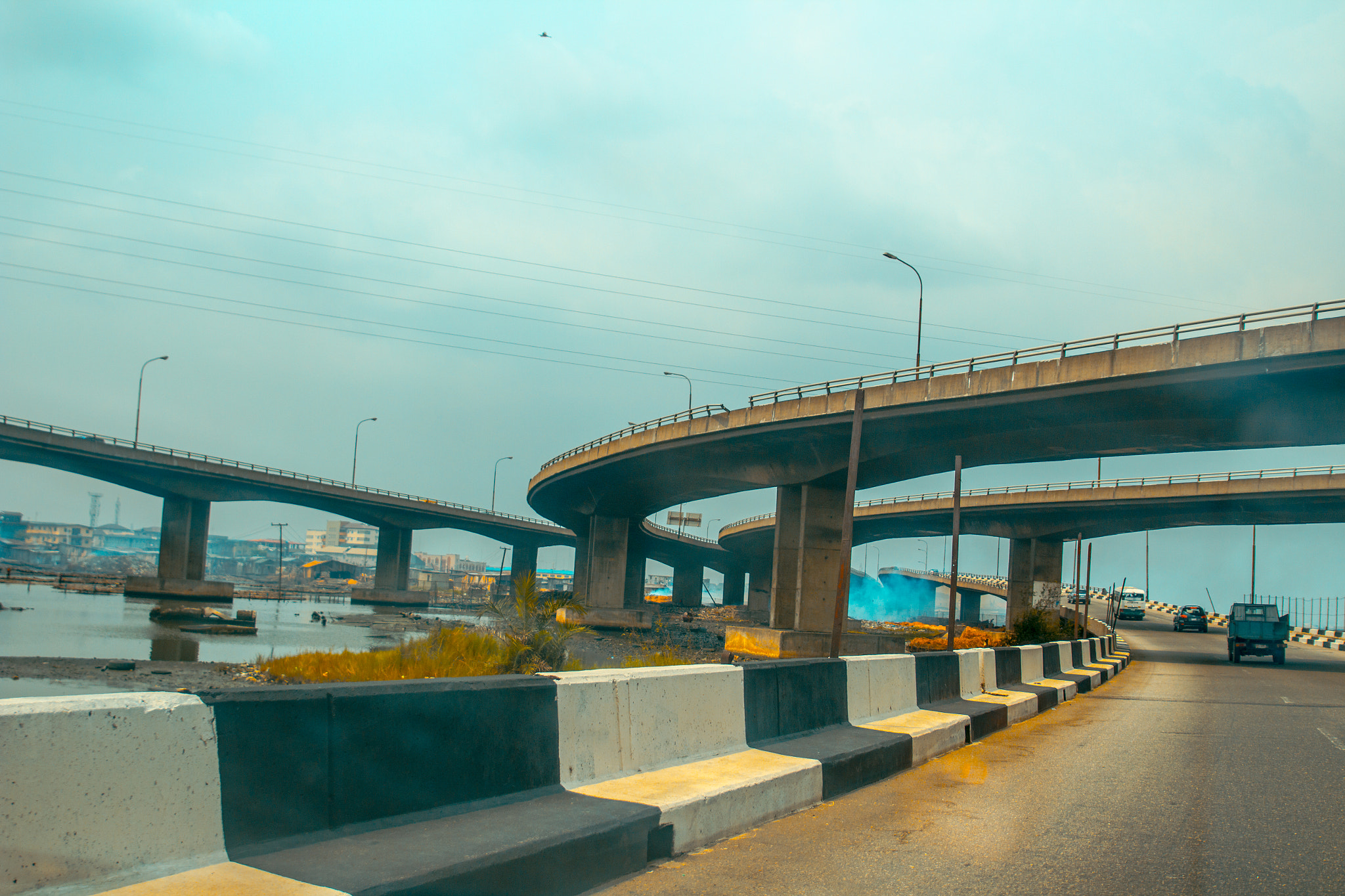 Canon EOS 1200D (EOS Rebel T5 / EOS Kiss X70 / EOS Hi) + Sigma 24-70mm F2.8 EX DG Macro sample photo. A flyover bridge in lagos nigeria. photography