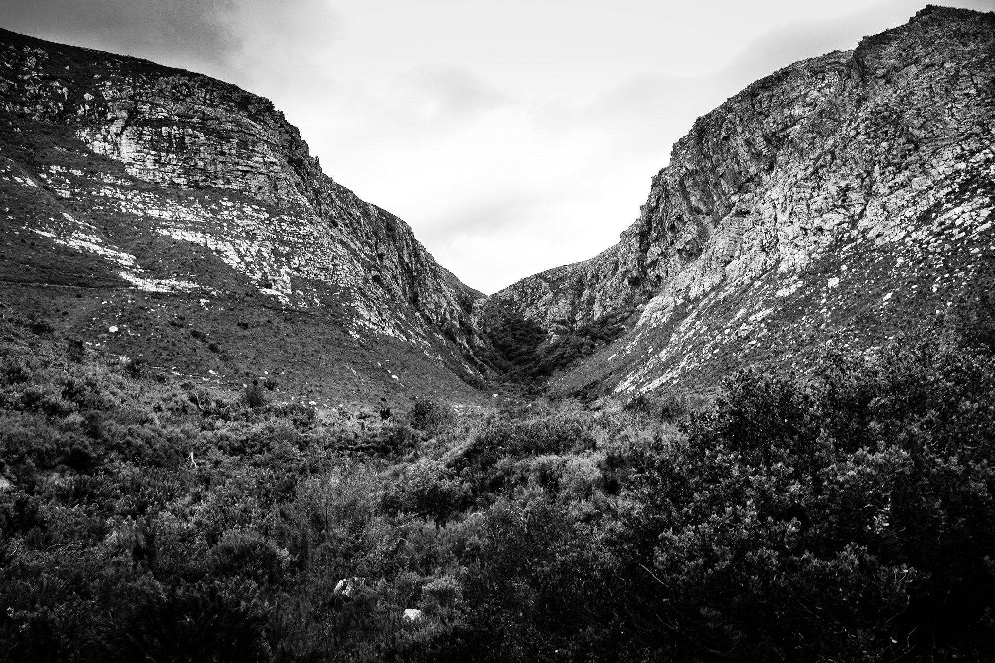 Sigma 18-250mm F3.5-6.3 DC OS HSM sample photo. Between mountains b&w photography