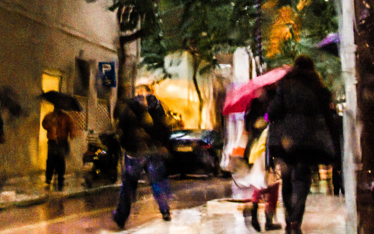Sigma 18-250mm F3.5-6.3 DC OS HSM sample photo. Walking in the rain photography
