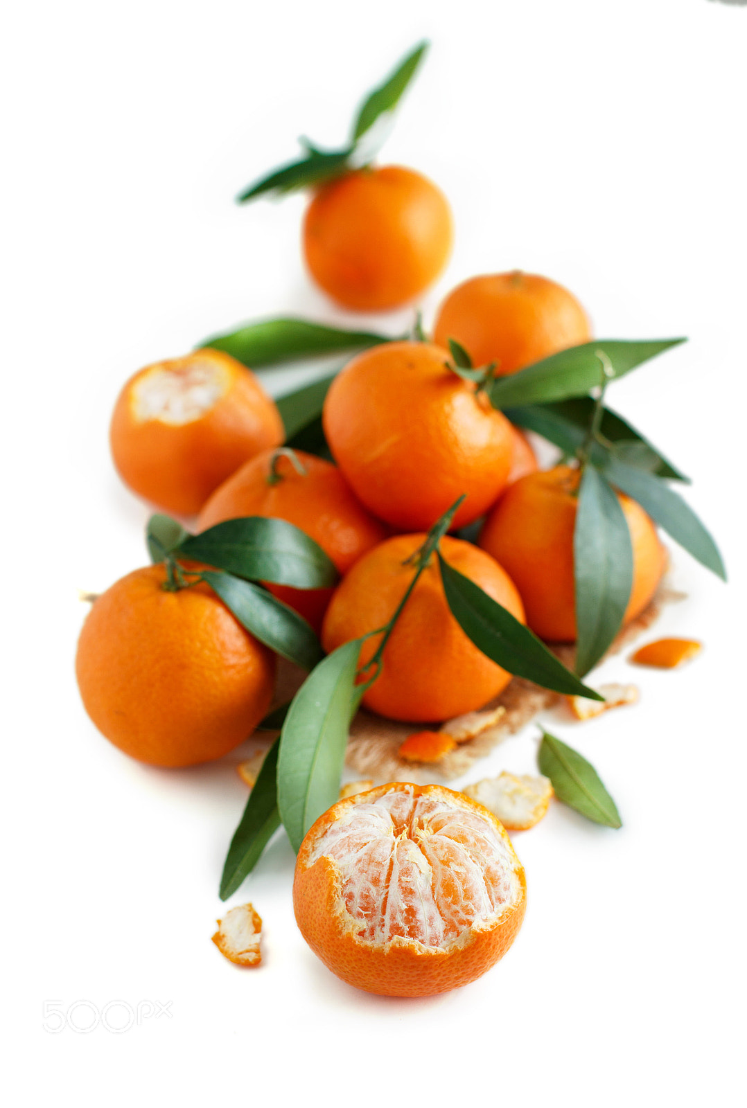 Canon EOS 650D (EOS Rebel T4i / EOS Kiss X6i) + Canon EF 50mm F1.2L USM sample photo. Mandarins with leaves photography