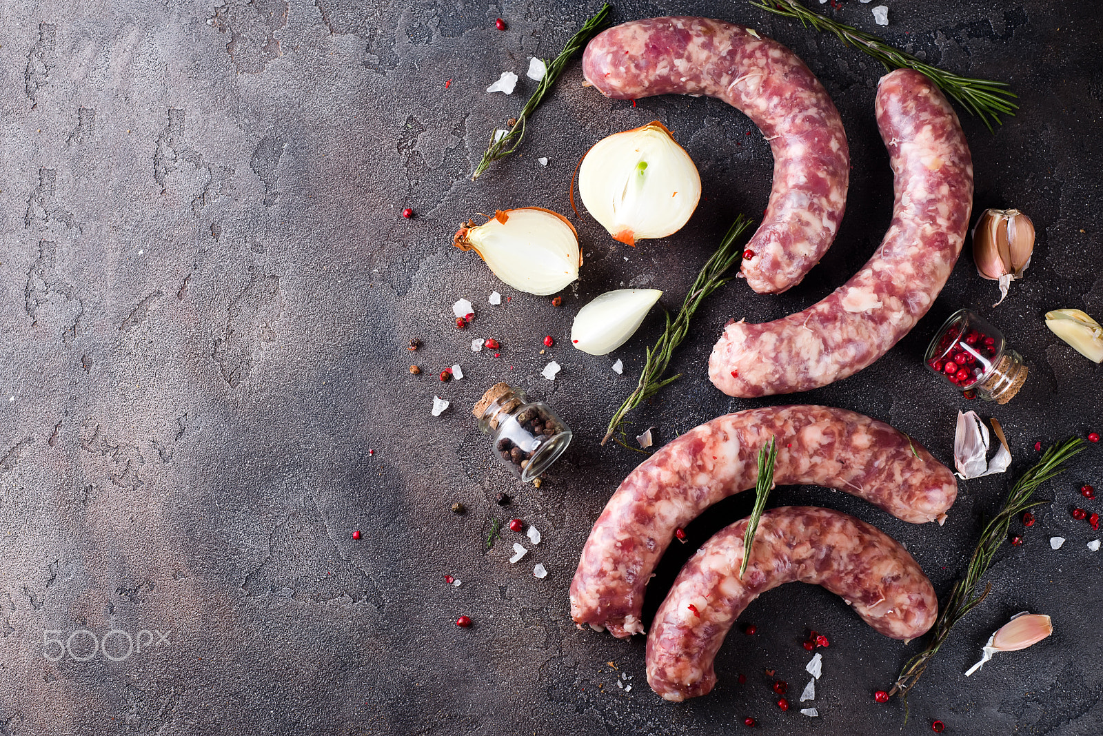 Nikon D610 sample photo. Raw sausages with spice photography