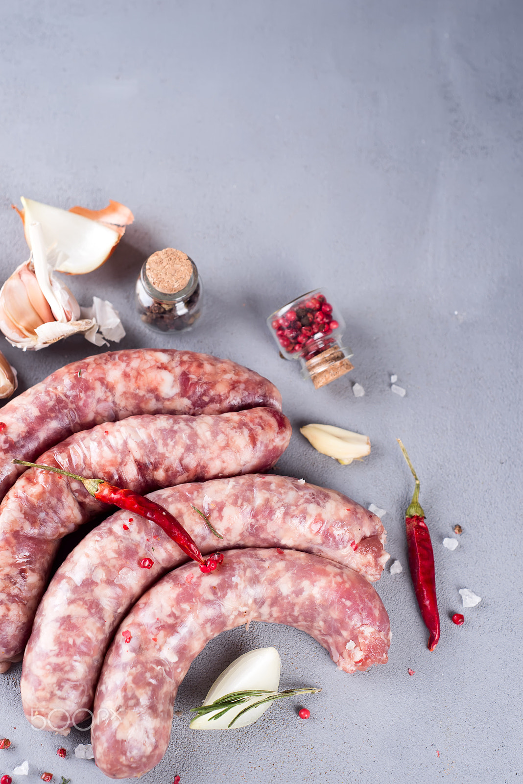 Nikon D610 + AF Nikkor 50mm f/1.8 sample photo. Raw sausage with spices photography