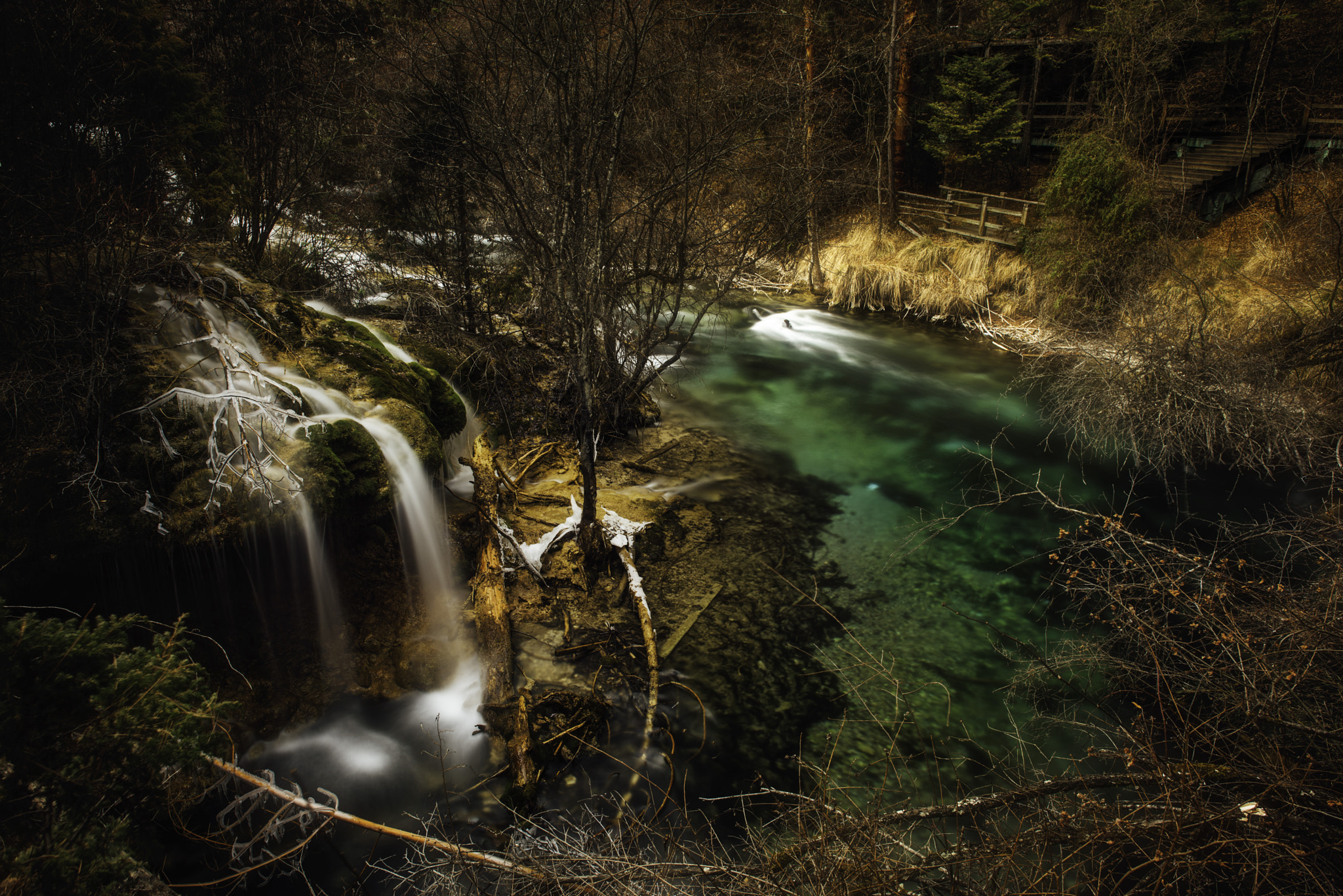 Nikon D810 + Nikon AF-S Nikkor 24mm F1.4G ED sample photo. Green water, beautiful waterfalls, yellow trees in late winter, constitute this beautiful picture photography