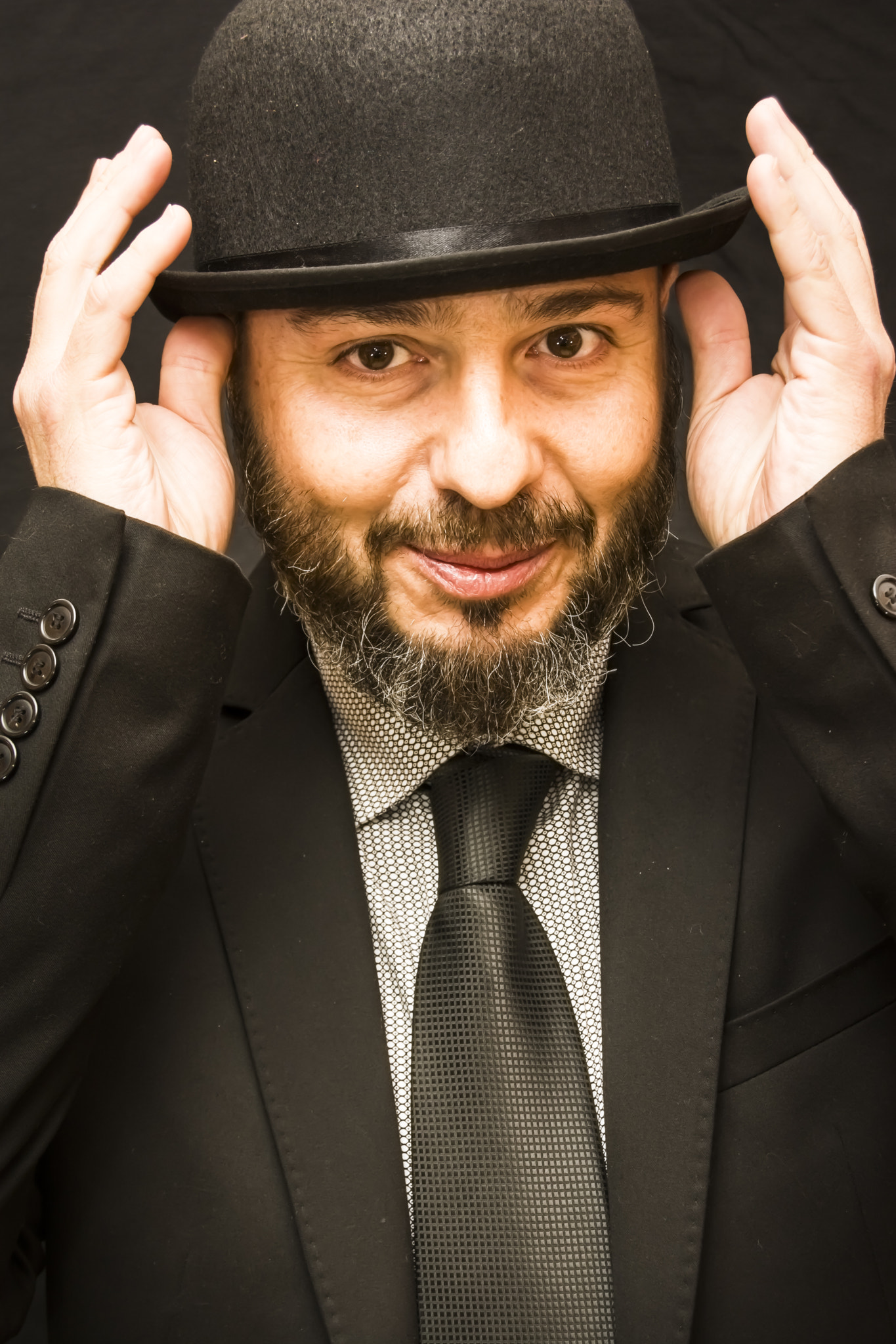 Nikon D7100 sample photo. Handsome, bald man with beard, suit, tie and hat, on black backg photography