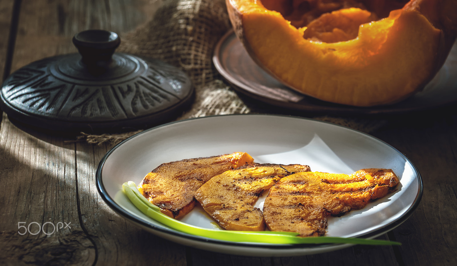 Sony Alpha NEX-6 sample photo. Slices of juicy orange pumpkin with spices, fried on the grill pan photography
