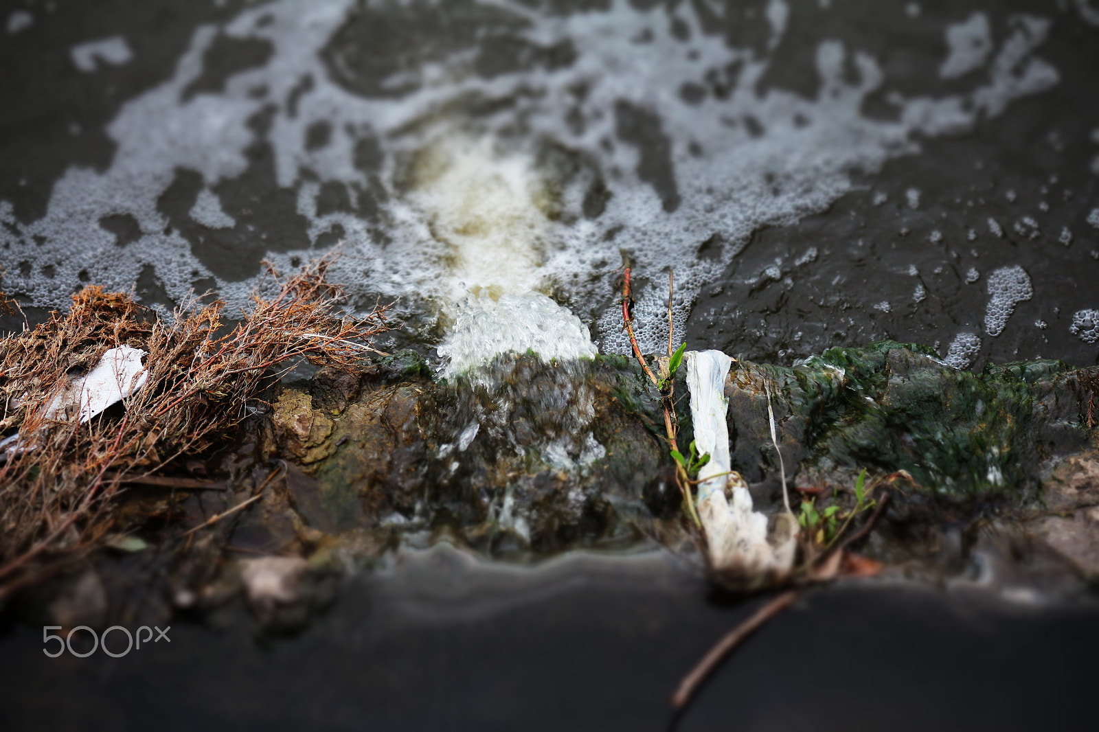 Canon EF-S 55-250mm F4-5.6 IS II sample photo. Rocks and water photography