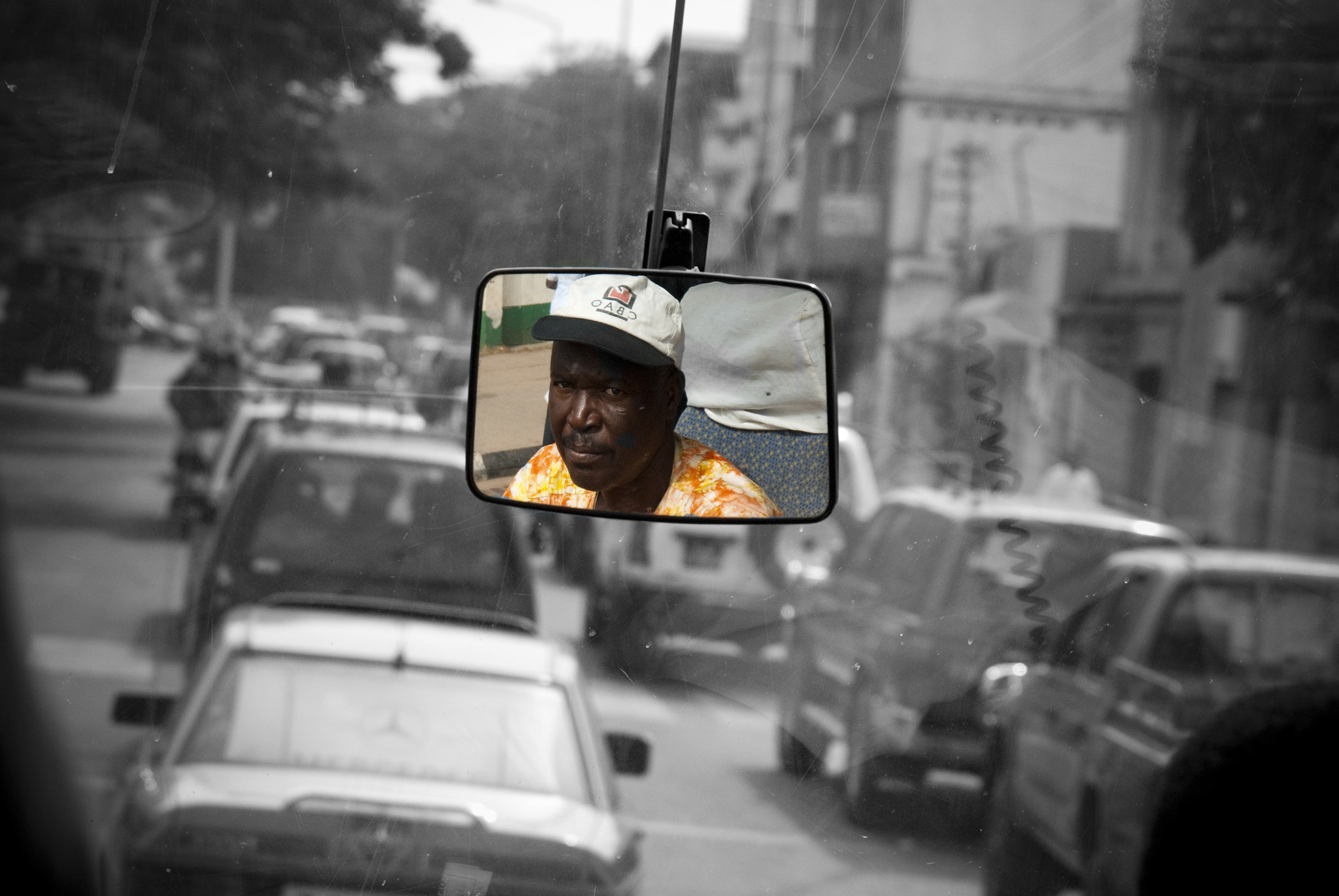 Nikon AF Nikkor 24-85mm F2.8-4D IF sample photo. Busdriver in gambia photography