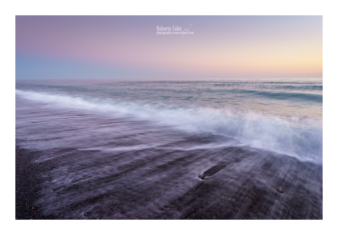 Sony a7 + Canon EF 17-40mm F4L USM sample photo. Waves on black sand photography