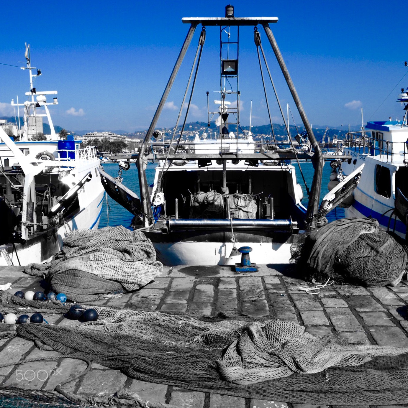 Olympus PEN-F sample photo. Fisherman on blue photography