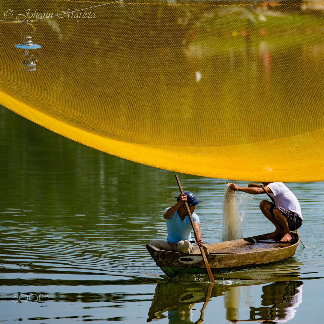 Nikon D7100 + Tamron SP 70-200mm F2.8 Di VC USD sample photo. "city fishing" hoi an, vietnam photography
