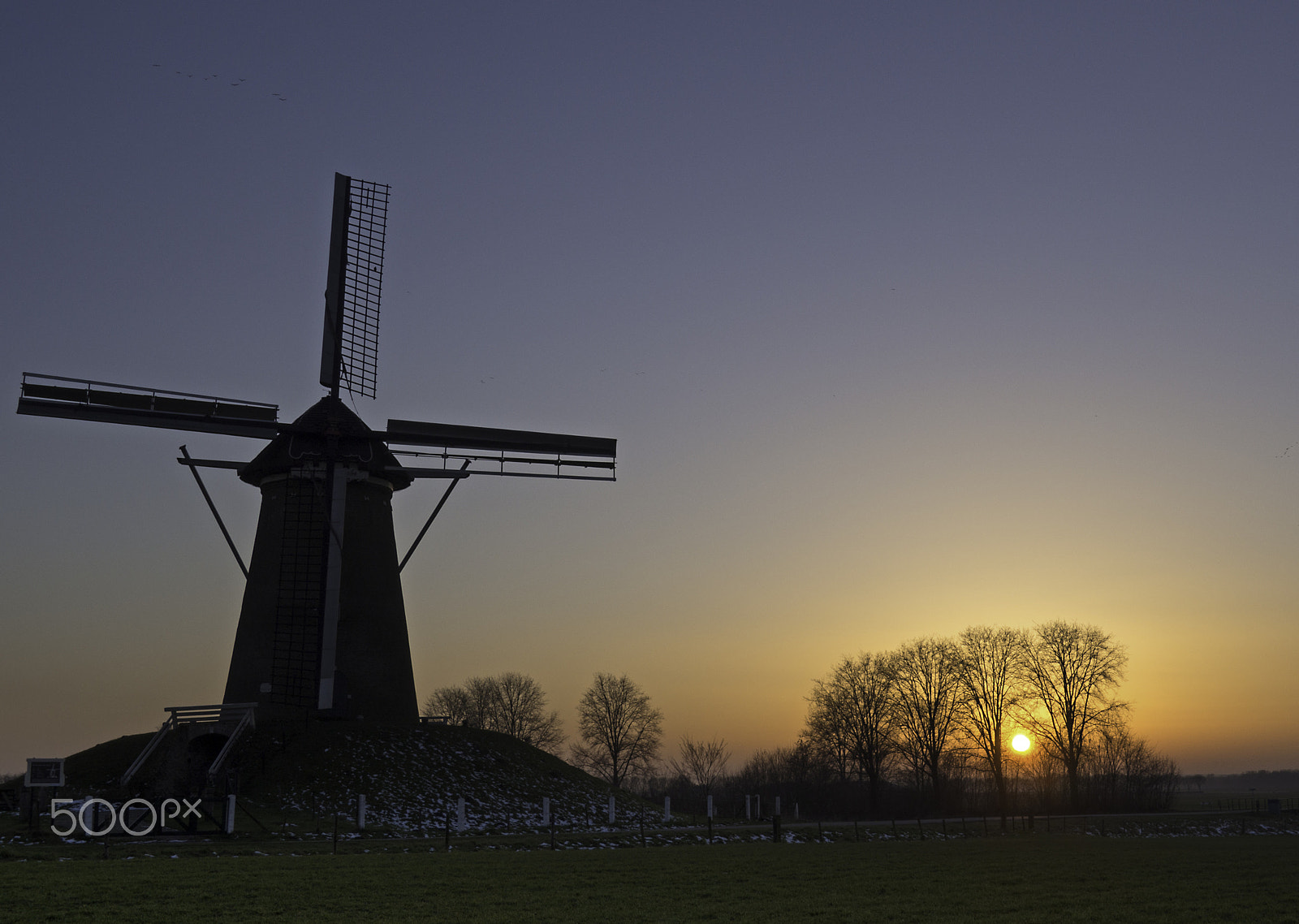 Olympus OM-D E-M10 sample photo. Bronkhorster mill overlooking the sunset photography