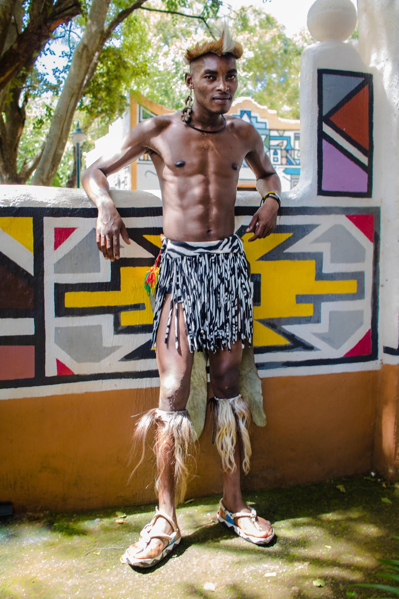 Canon EF-S 24mm F2.8 STM sample photo. Zulu in ndebele village photography