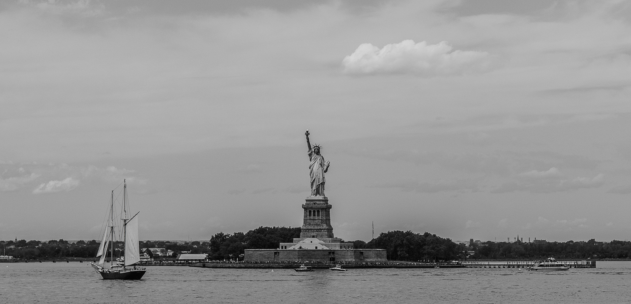 Canon EF 50mm F1.4 USM sample photo. Statue of liberty from the water photography