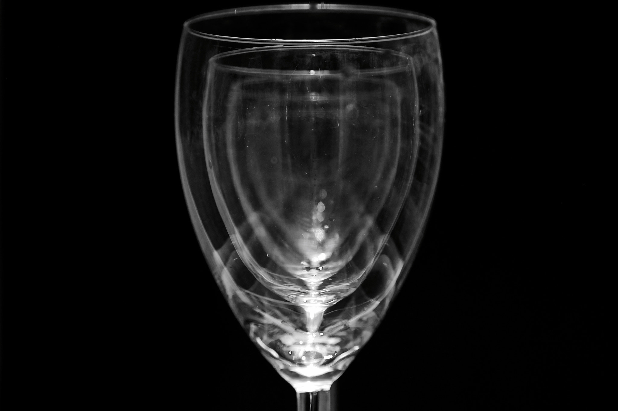 Canon EOS 700D (EOS Rebel T5i / EOS Kiss X7i) + Canon EF 24-105mm F4L IS USM sample photo. Wine glasses black and white photography