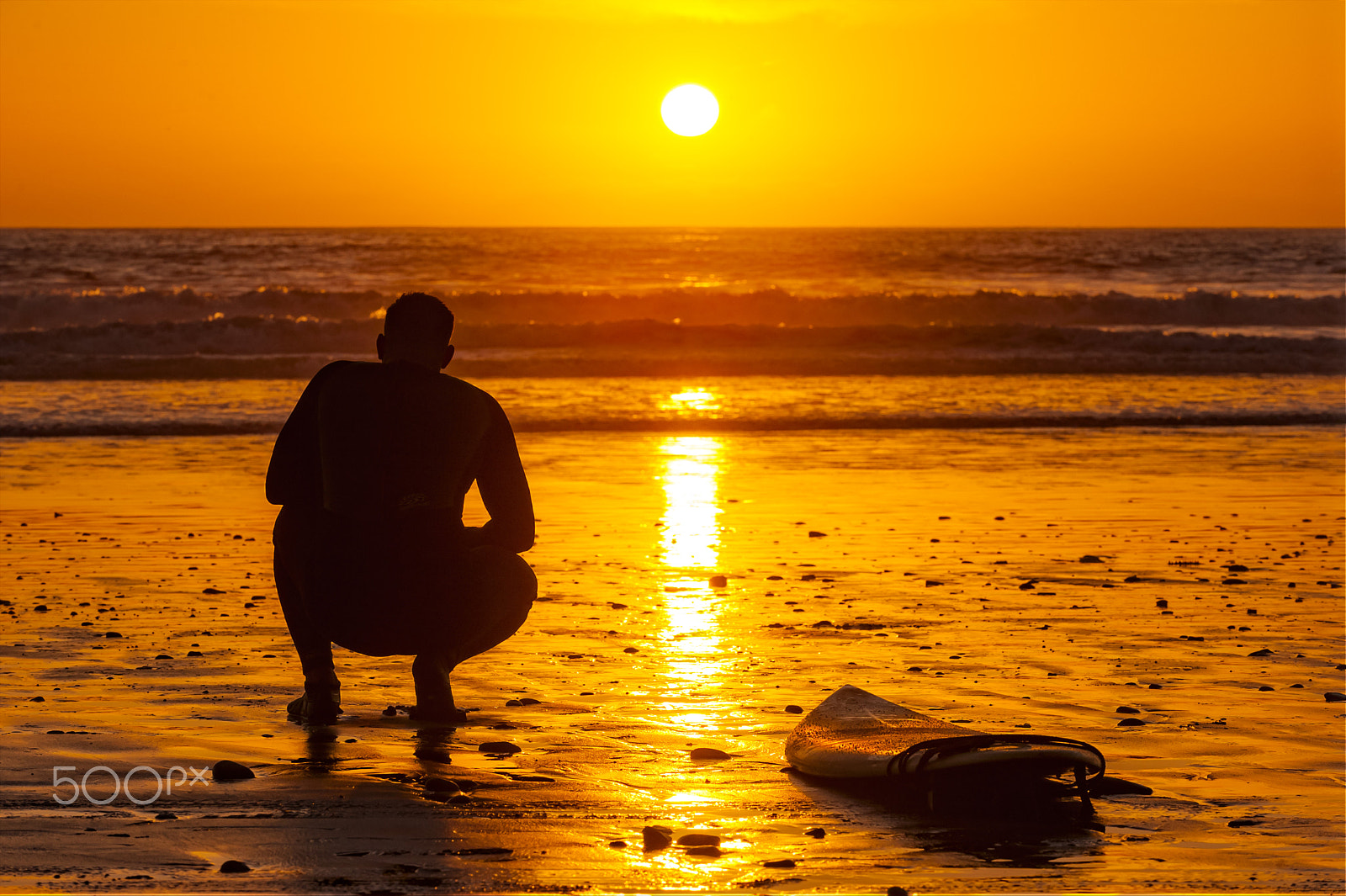 Nikon D700 sample photo. A surfer watches the sunset in oceanside photography