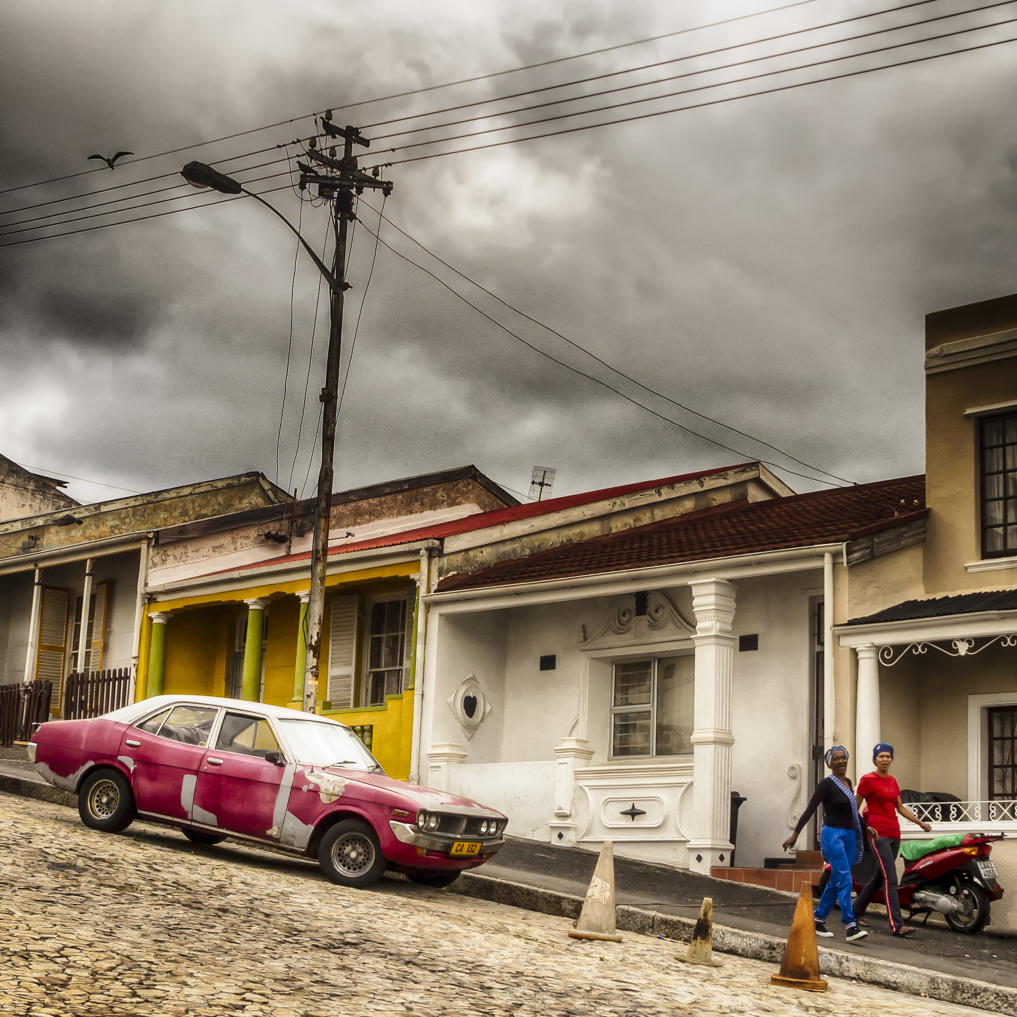 Olympus OM-D E-M10 + Olympus M.Zuiko Digital ED 12-40mm F2.8 Pro sample photo. Raw life contrasts of bo-kaap photography