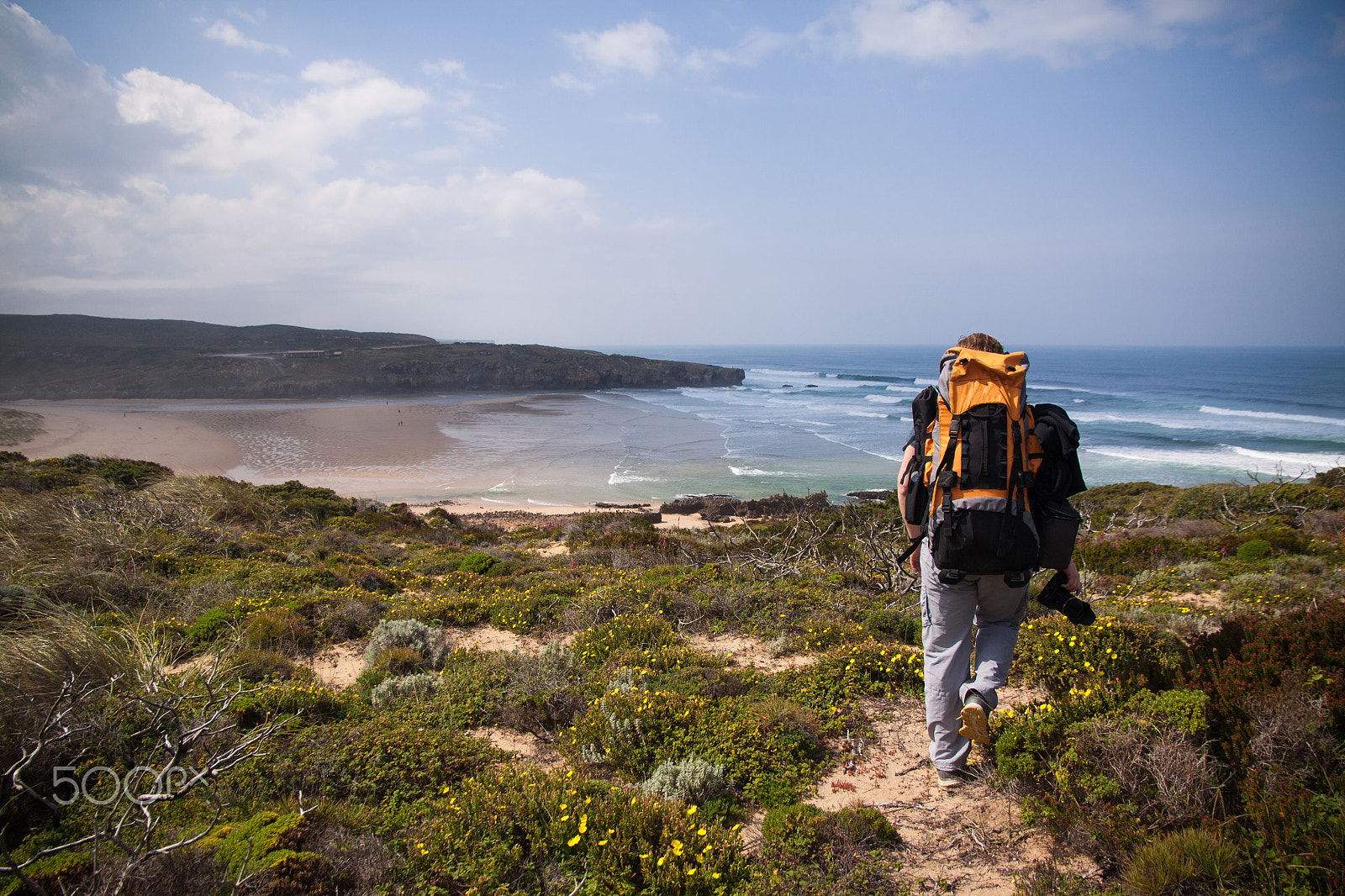 Canon EOS 50D sample photo. Tourist with backpack on the edge of a beautiful cliff near the ocean portugal algarve photography