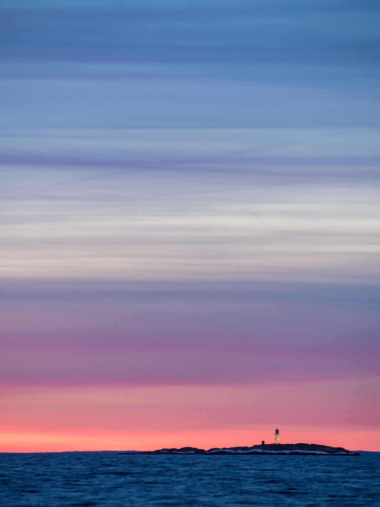 Olympus OM-D E-M10 sample photo. Lighthouse under impossible sky photography