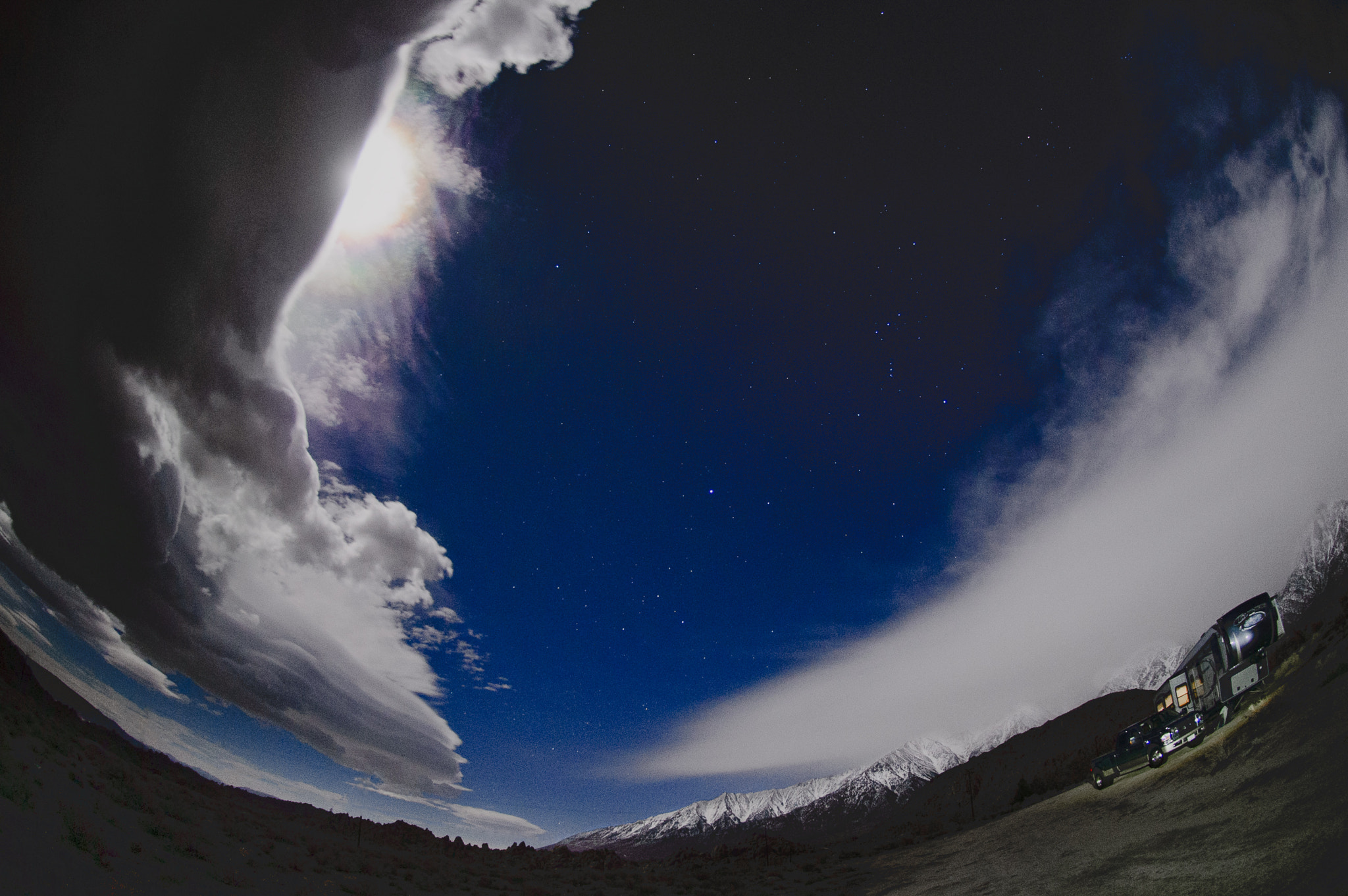 Nikon AF DX Fisheye-Nikkor 10.5mm F2.8G ED sample photo. Full moon emerging from storm clouds over mtns. photography