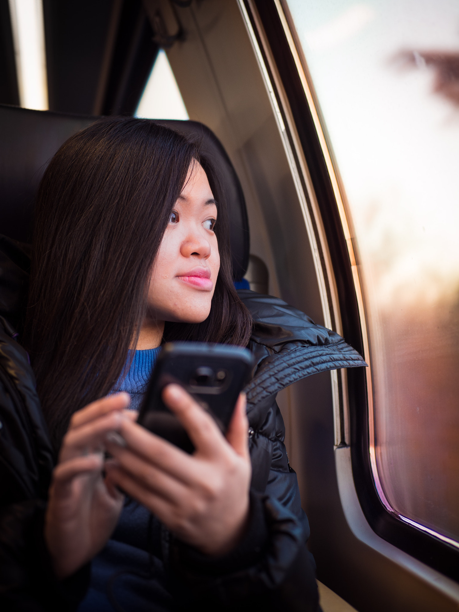 Olympus OM-D E-M1 Mark II + OLYMPUS M.25mm F1.2 sample photo. Train ride at sunset photography