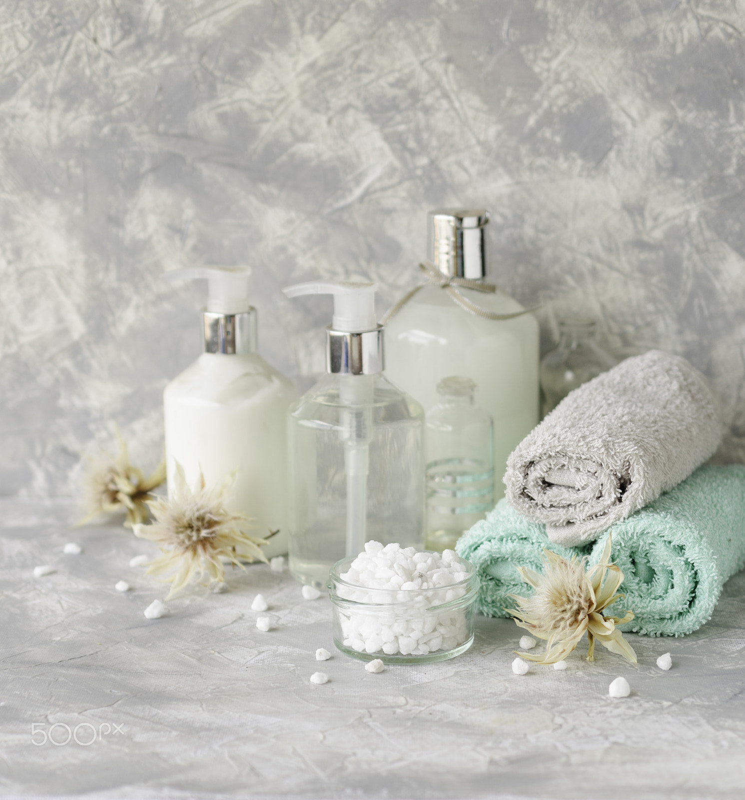 Nikon AF-S DX Micro Nikkor 40mm F2.8 sample photo. Spa set on a white marble table with a stack of towels, selective focus photography