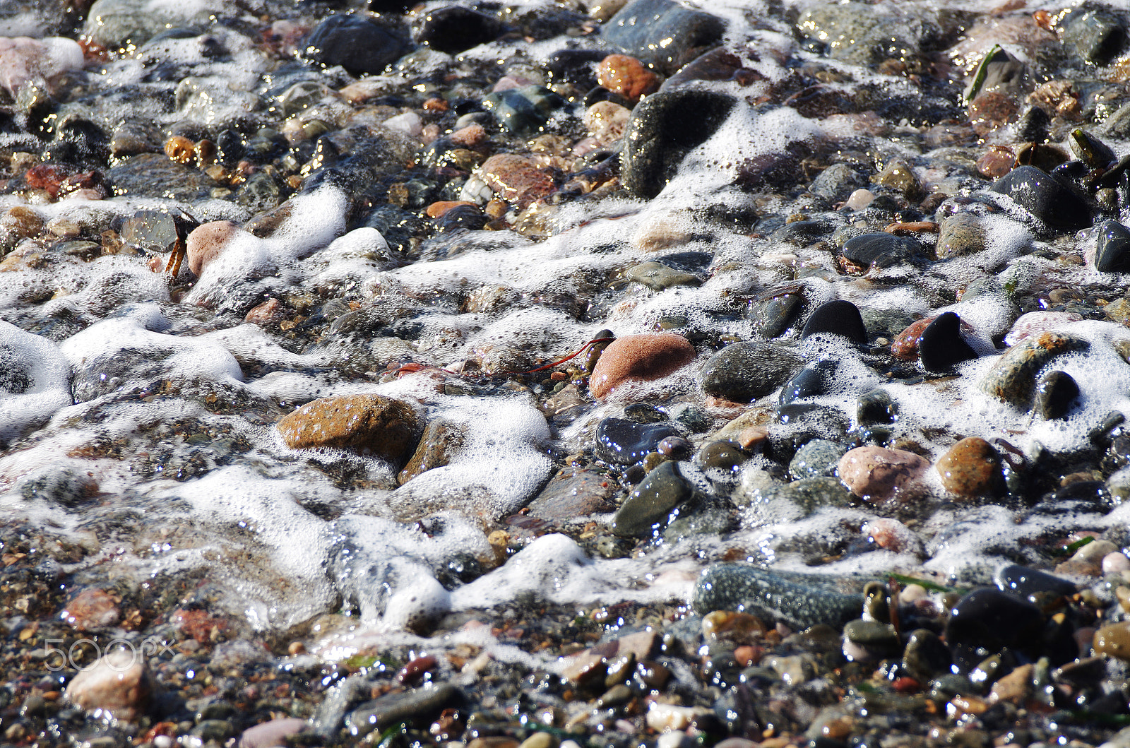 Pentax K-5 + Sigma 70-300mm F4-5.6 DG OS sample photo. Stones on the beach photography