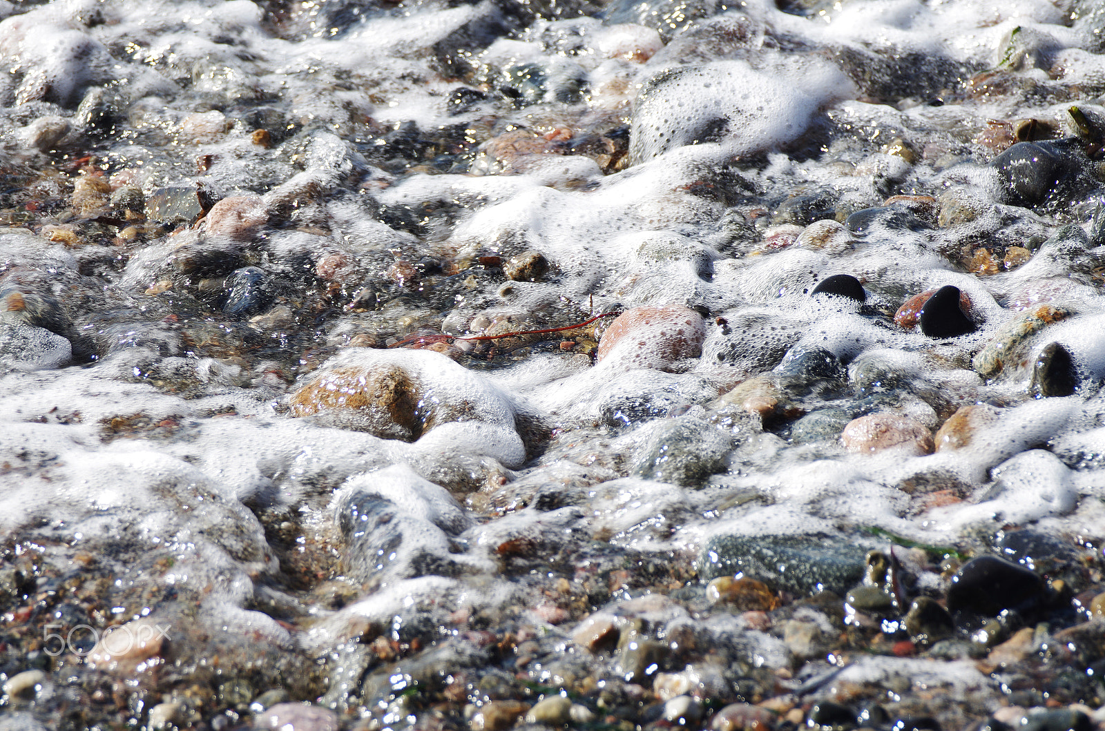 Sigma 70-300mm F4-5.6 DG OS sample photo. Stones on the beach photography