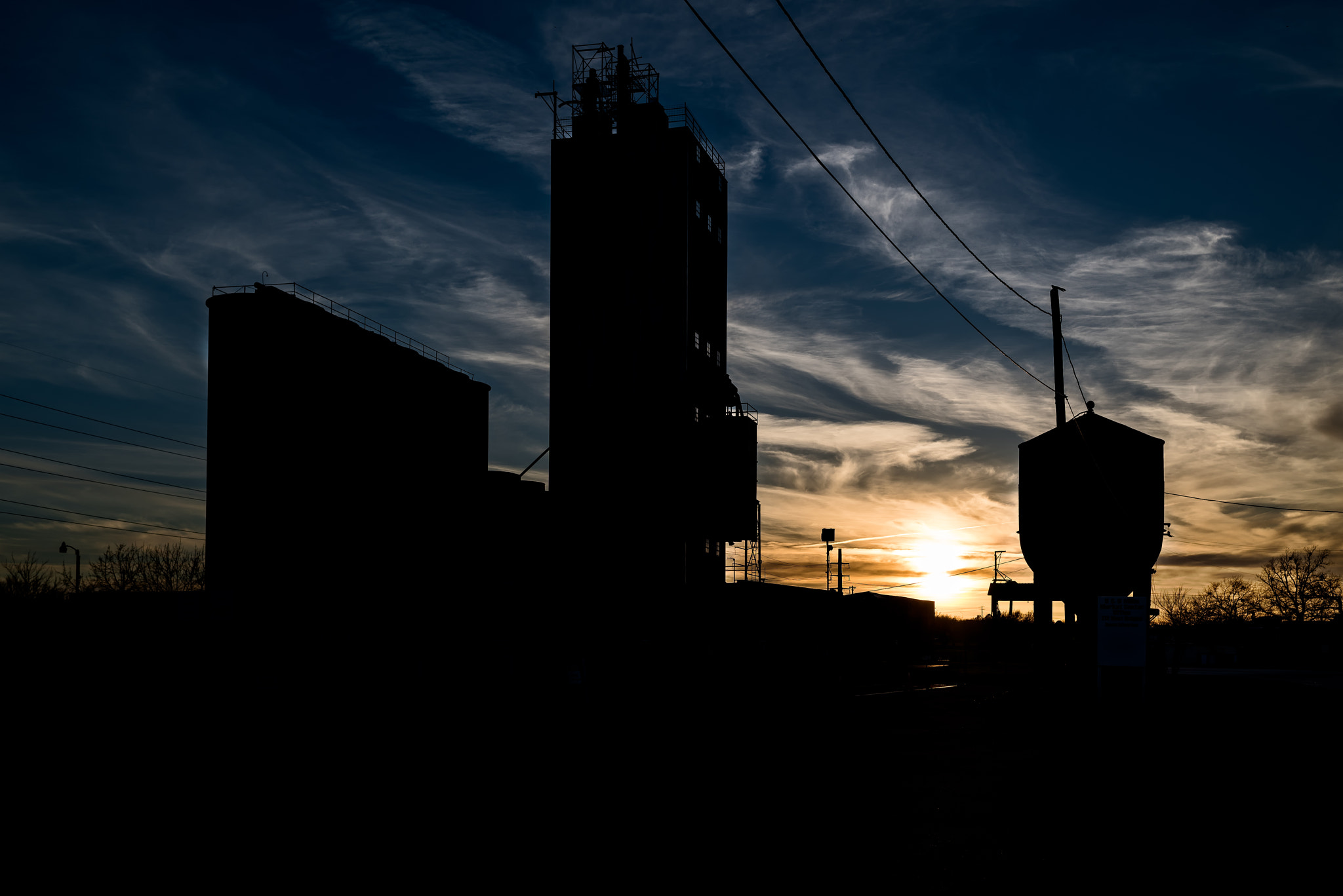 Nikon AF Nikkor 35mm F2D sample photo. Industrial building silhouette photography