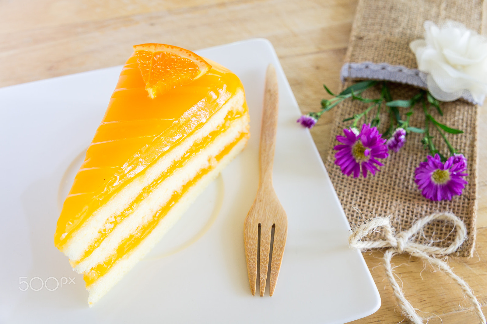 Sony Alpha NEX-3 + Sony E 18-55mm F3.5-5.6 OSS sample photo. Orange cake homemade. photography