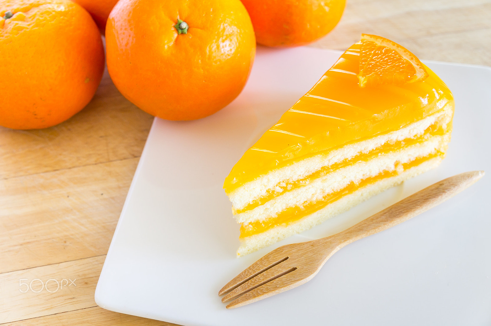 Sony Alpha NEX-3 + Sony E 18-55mm F3.5-5.6 OSS sample photo. Orange cake homemade. photography