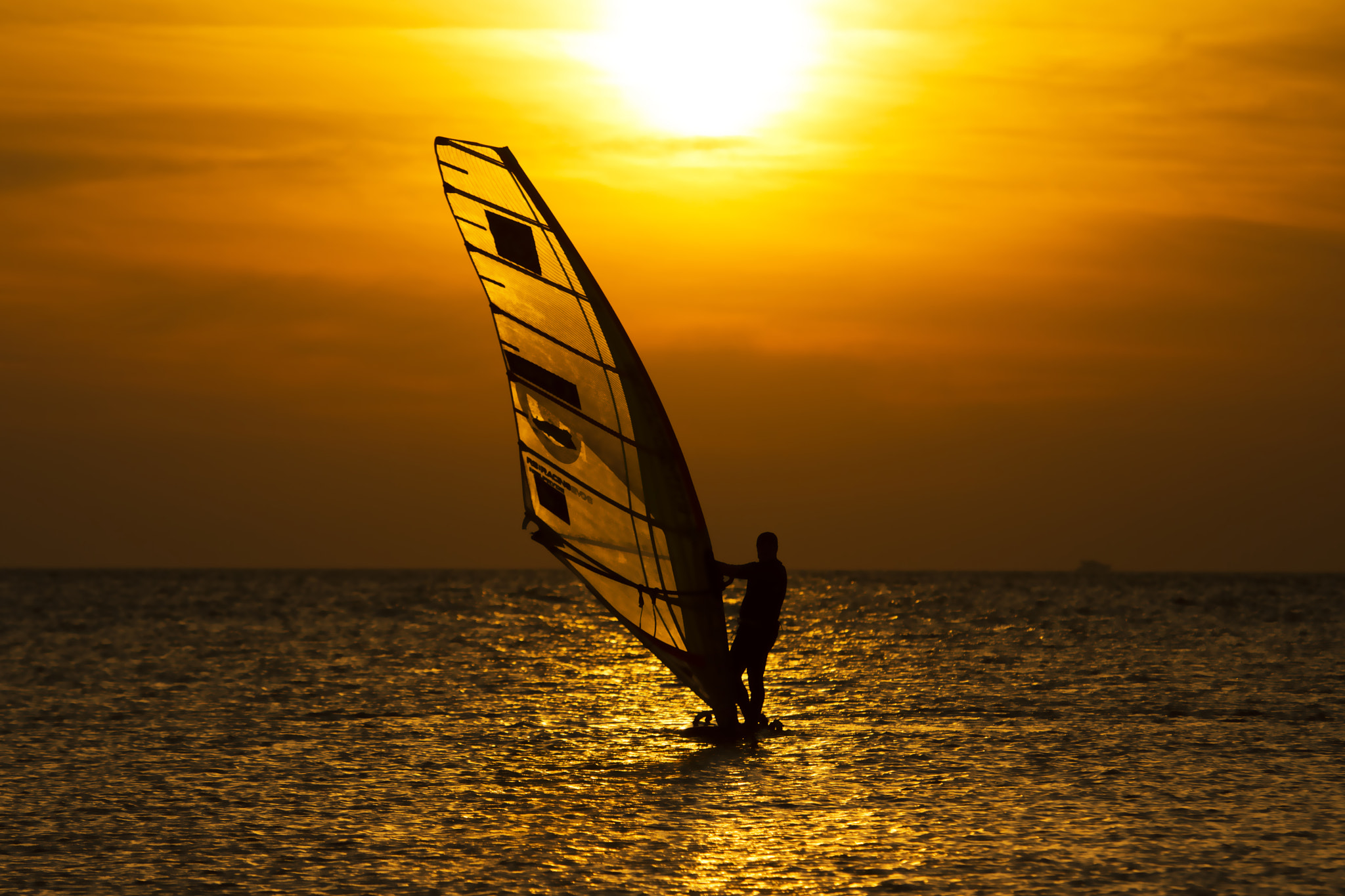 Nikon AF-S Nikkor 70-200mm F2.8G ED VR II sample photo. Boat at sunset photography